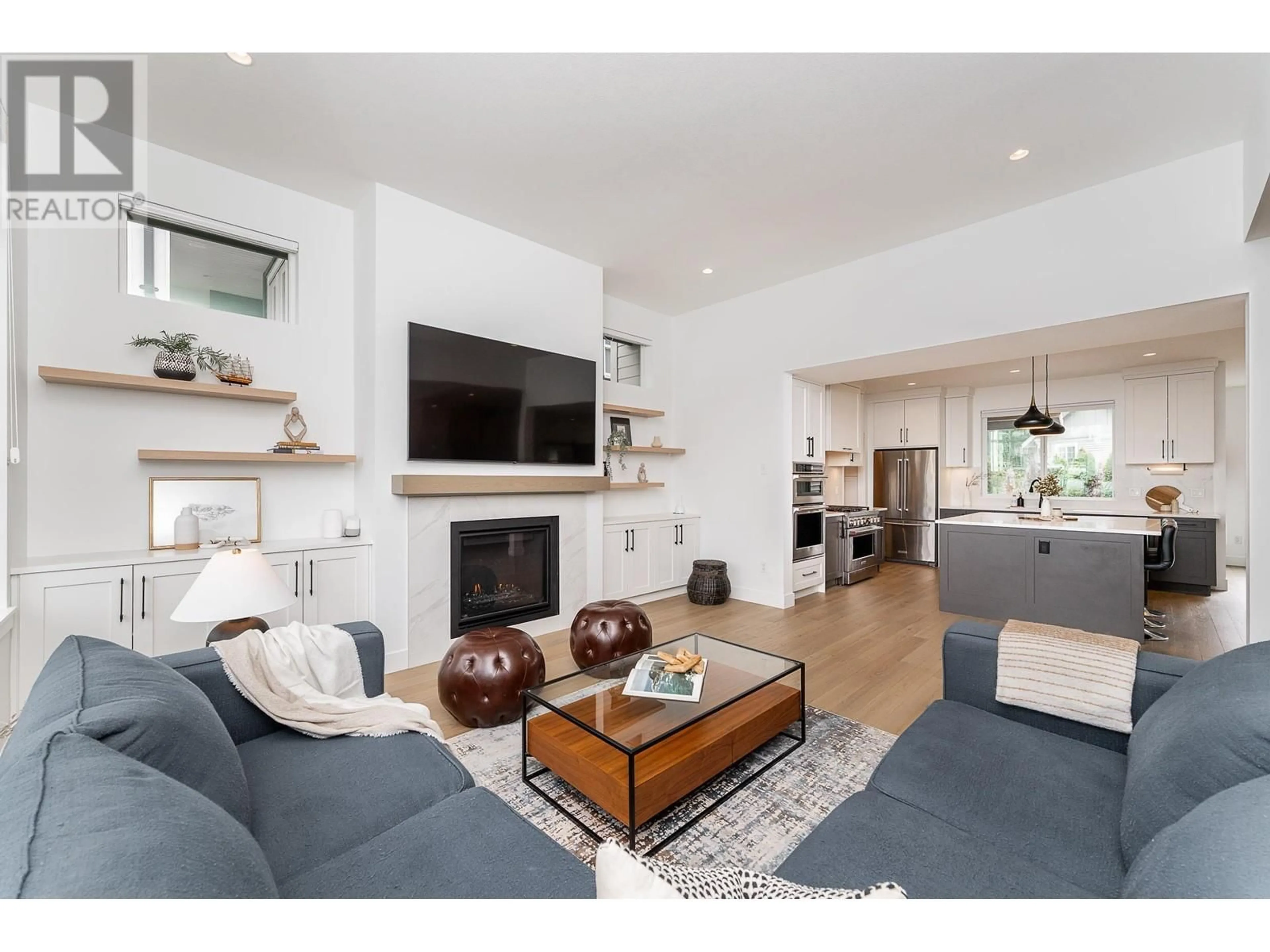 Living room with furniture, wood/laminate floor for 3484 HIGHLAND DRIVE, Coquitlam British Columbia V3E0N5
