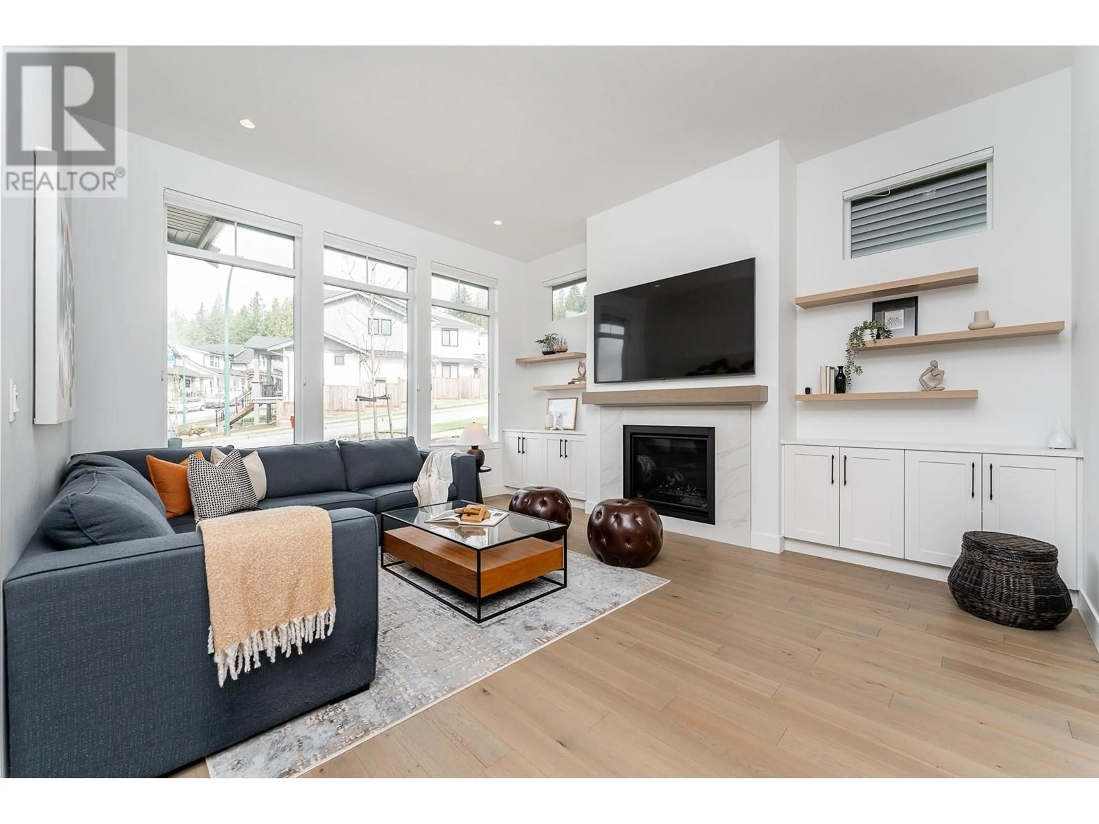 Living room with furniture, wood/laminate floor for 3484 HIGHLAND DRIVE, Coquitlam British Columbia V3E0N5