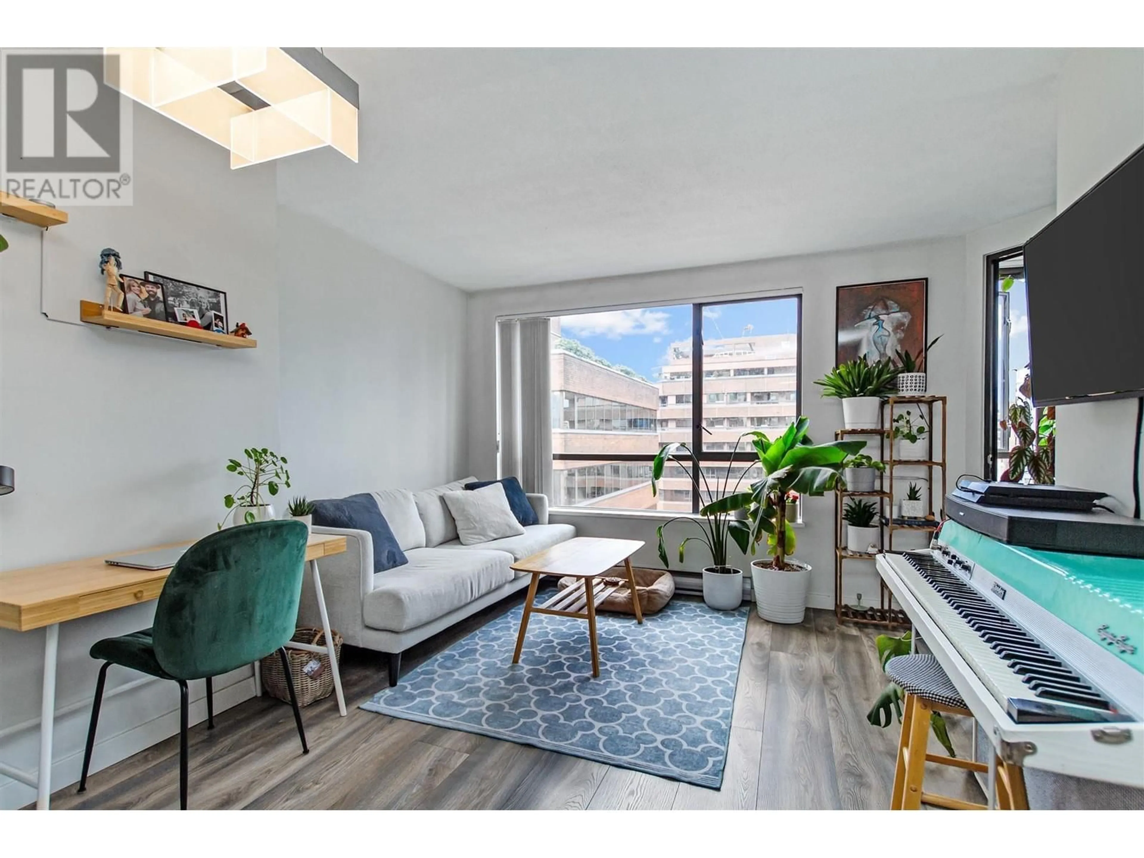 Living room with furniture, unknown for 1809 - 1189 HOWE STREET, Vancouver British Columbia V6Z2X4