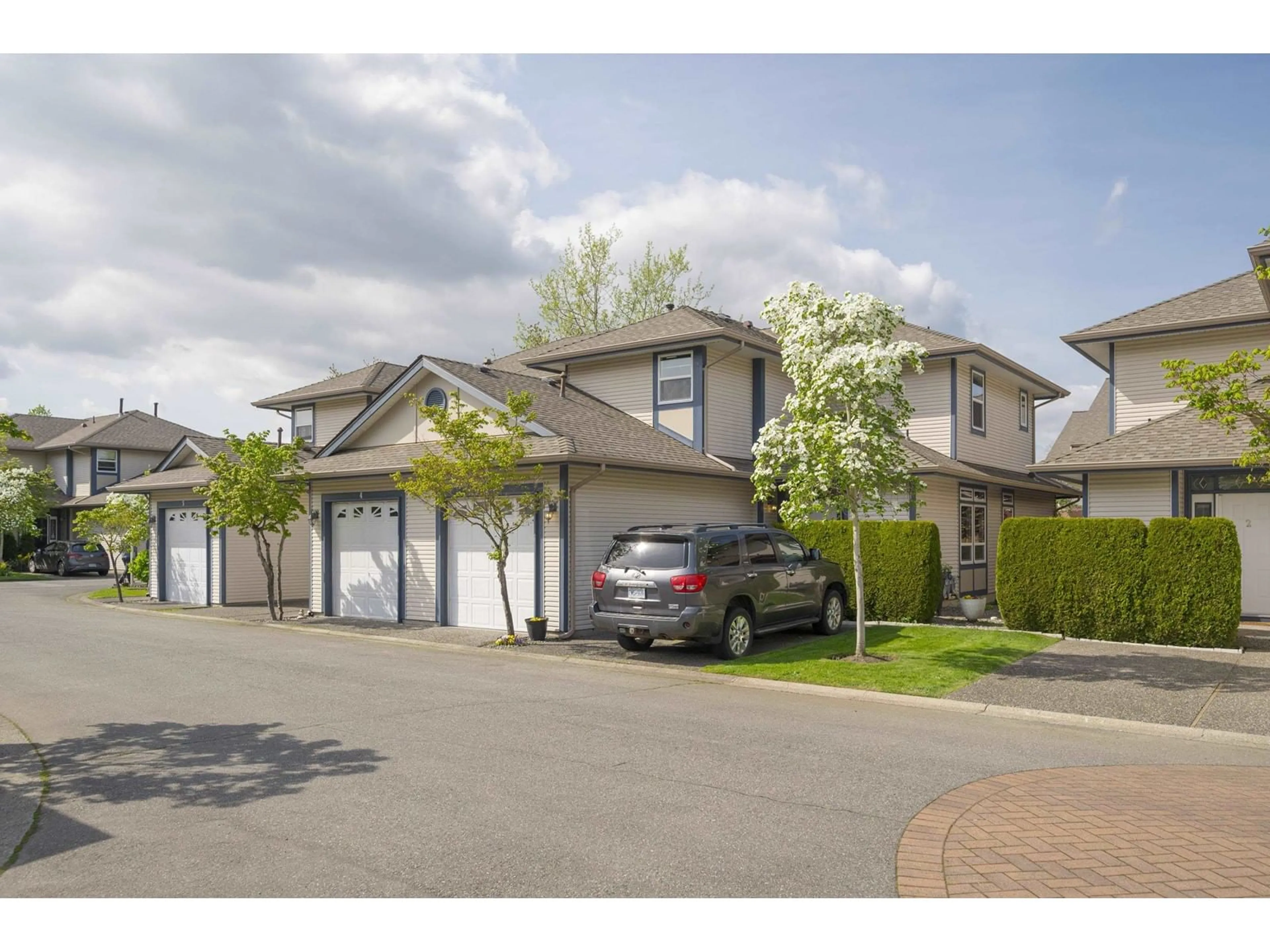 A pic from outside/outdoor area/front of a property/back of a property/a pic from drone, street for 3 - 4725 221, Langley British Columbia V2Z1B4