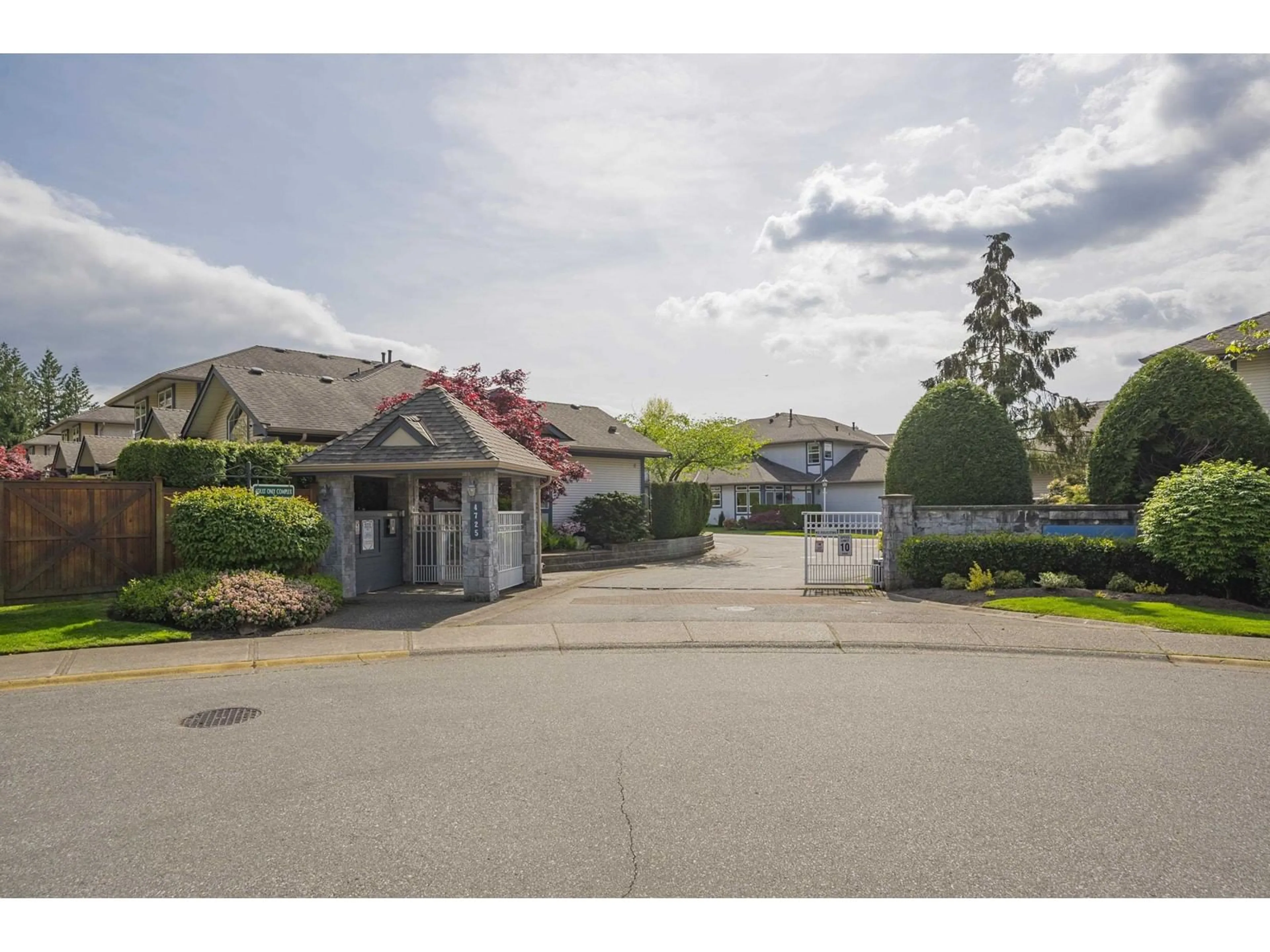 A pic from outside/outdoor area/front of a property/back of a property/a pic from drone, street for 3 - 4725 221, Langley British Columbia V2Z1B4