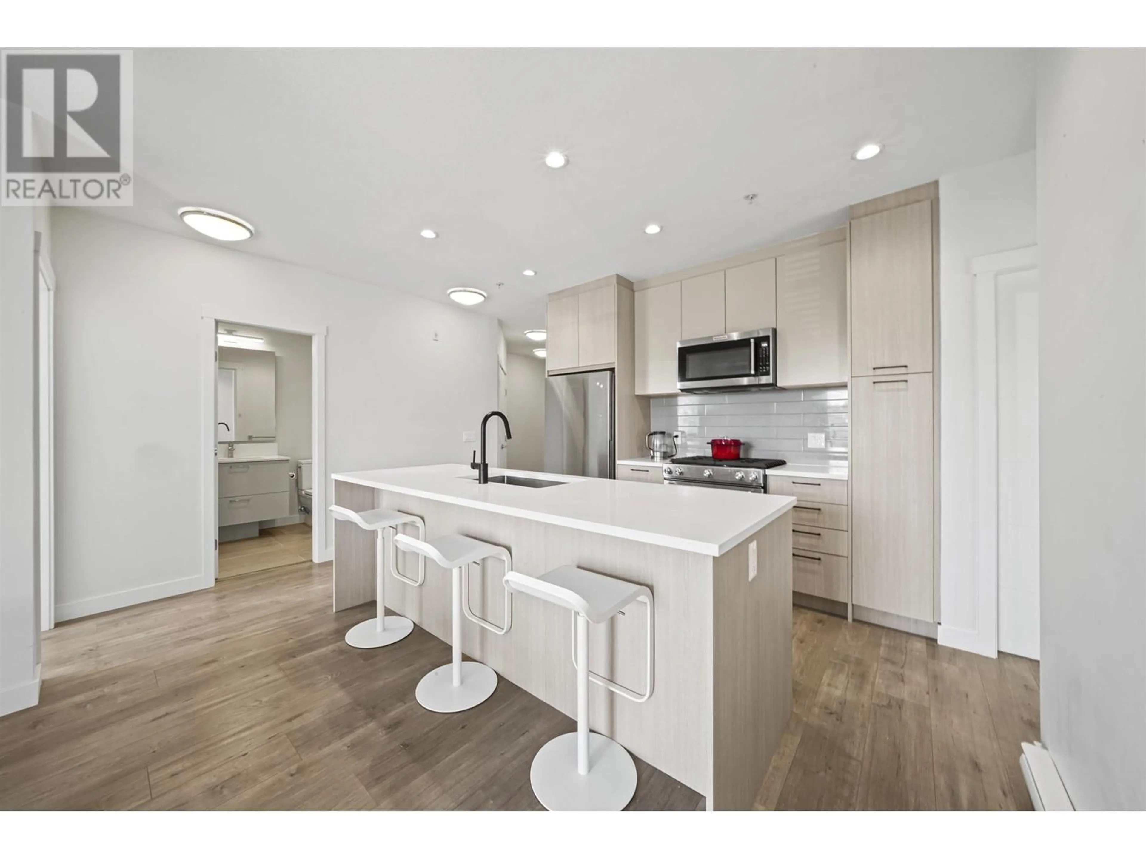Open concept kitchen, unknown for 305 - 707 COMO LAKE AVENUE, Coquitlam British Columbia V3J0J5