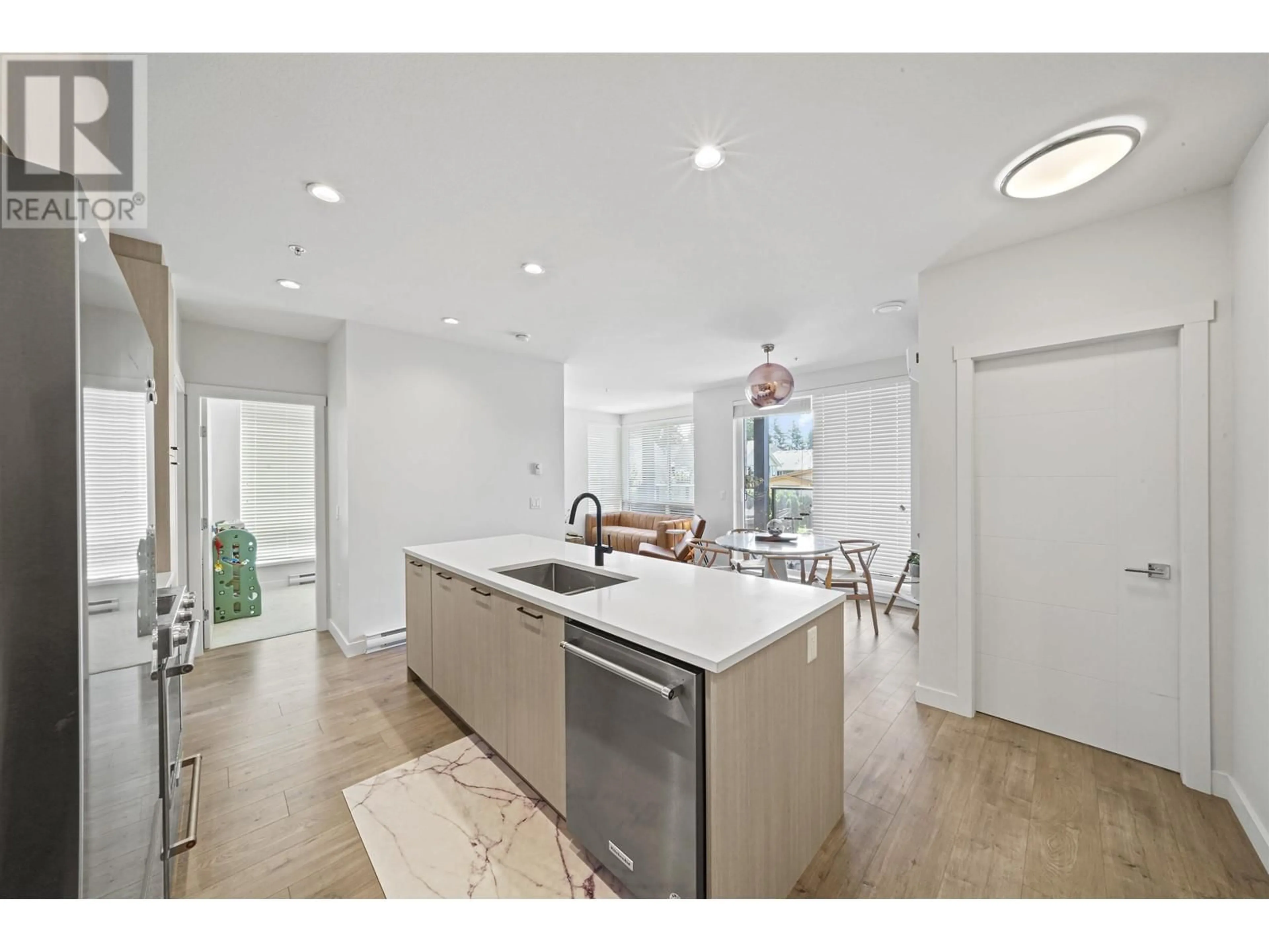 Open concept kitchen, unknown for 305 - 707 COMO LAKE AVENUE, Coquitlam British Columbia V3J0J5