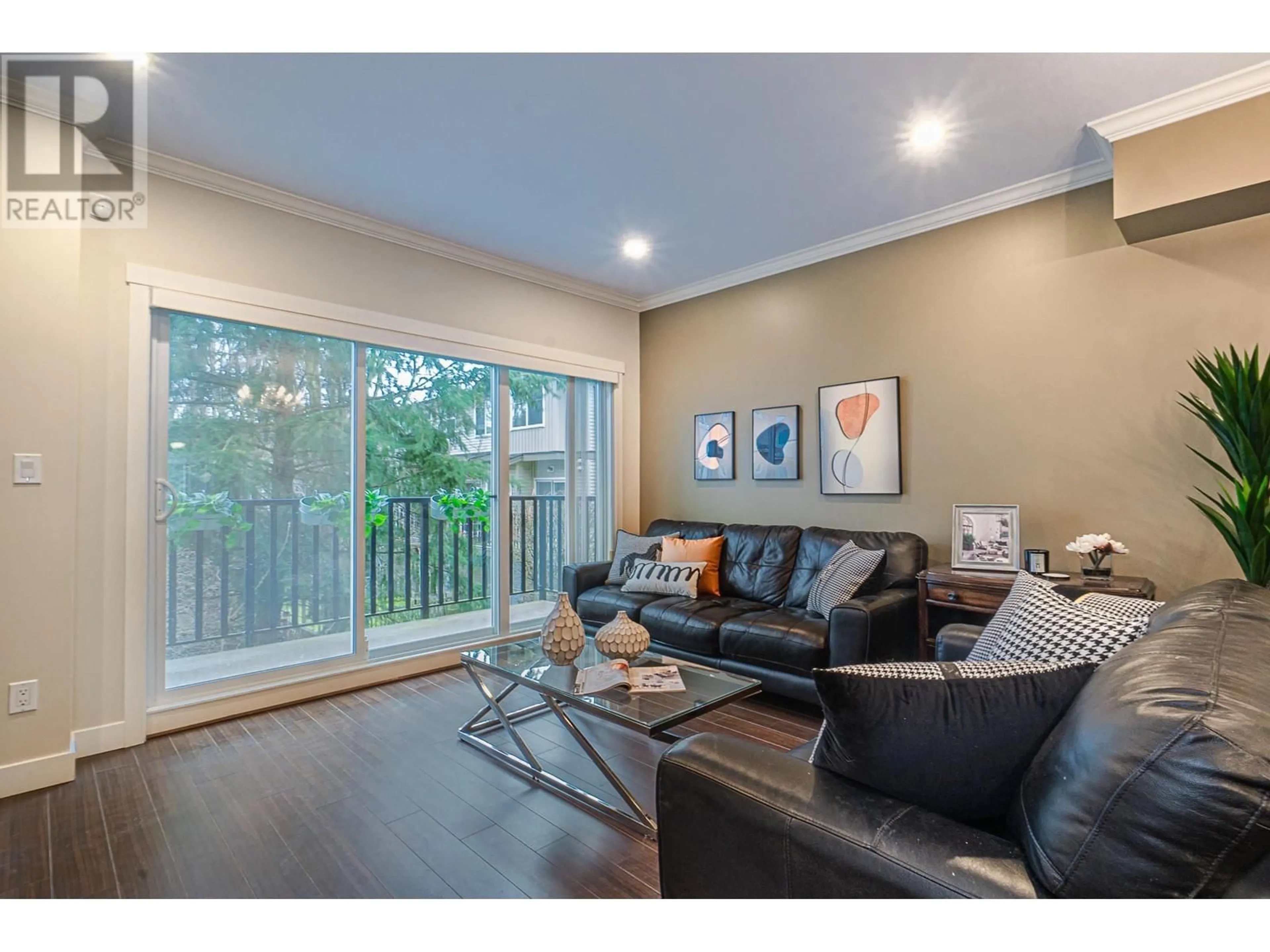 Living room with furniture, wood/laminate floor for 31 - 7051 ASH STREET, Richmond British Columbia V6Y2R9