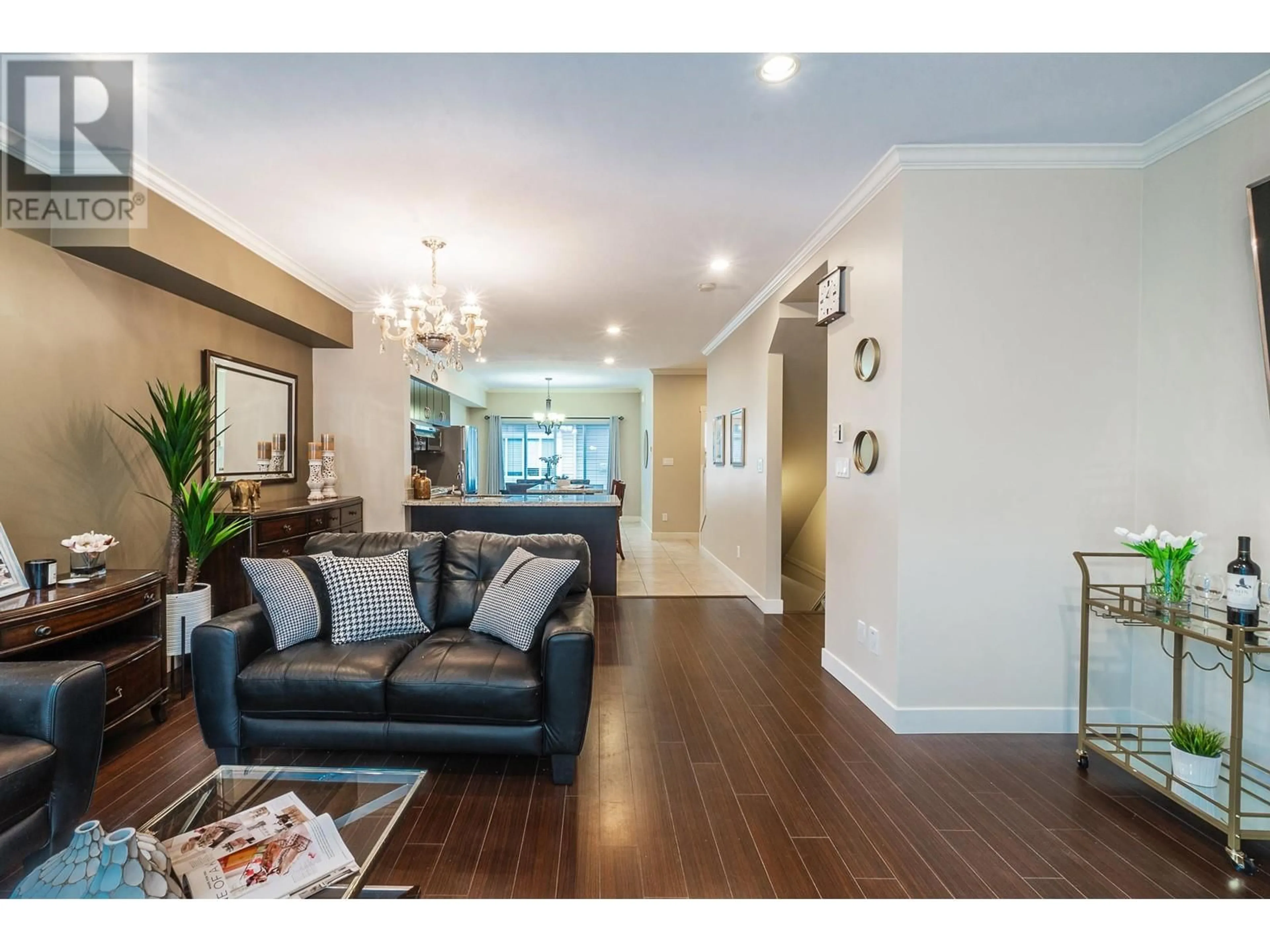 Living room with furniture, wood/laminate floor for 31 - 7051 ASH STREET, Richmond British Columbia V6Y2R9
