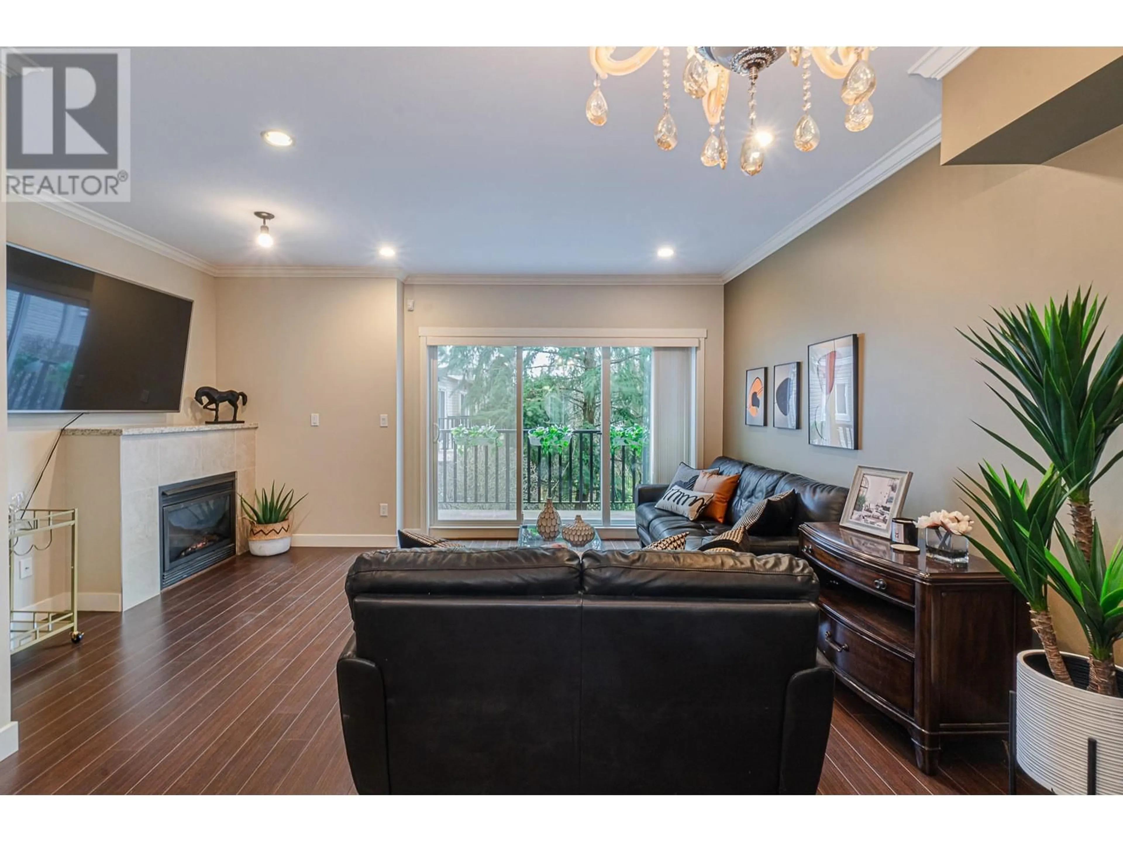 Living room with furniture, wood/laminate floor for 31 - 7051 ASH STREET, Richmond British Columbia V6Y2R9