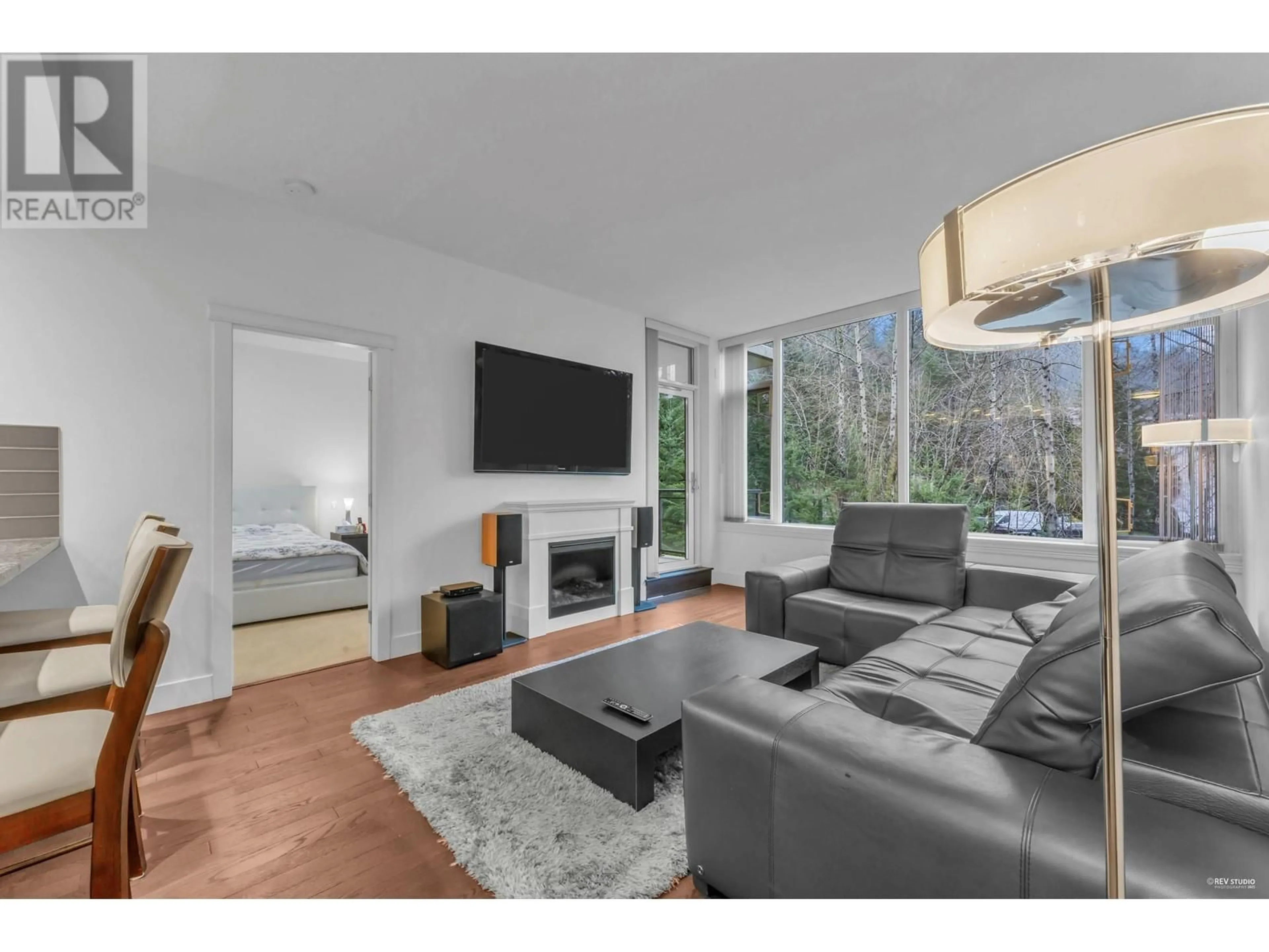 Living room with furniture, unknown for 707 - 1415 PARKWAY BOULEVARD, Coquitlam British Columbia V3E0C7