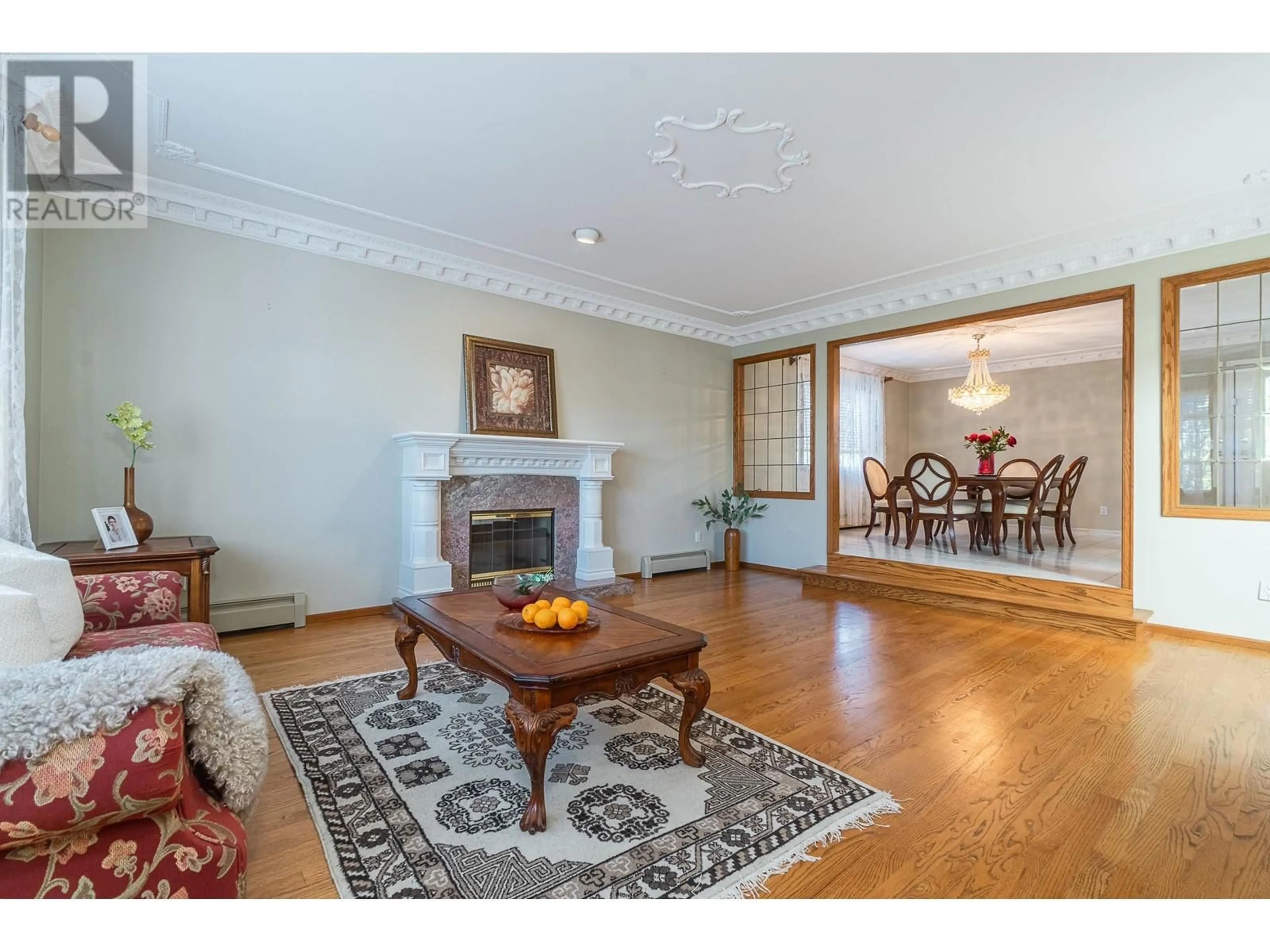Living room with furniture, wood/laminate floor for 6865 GRANT PLACE, Burnaby British Columbia V5B4X4