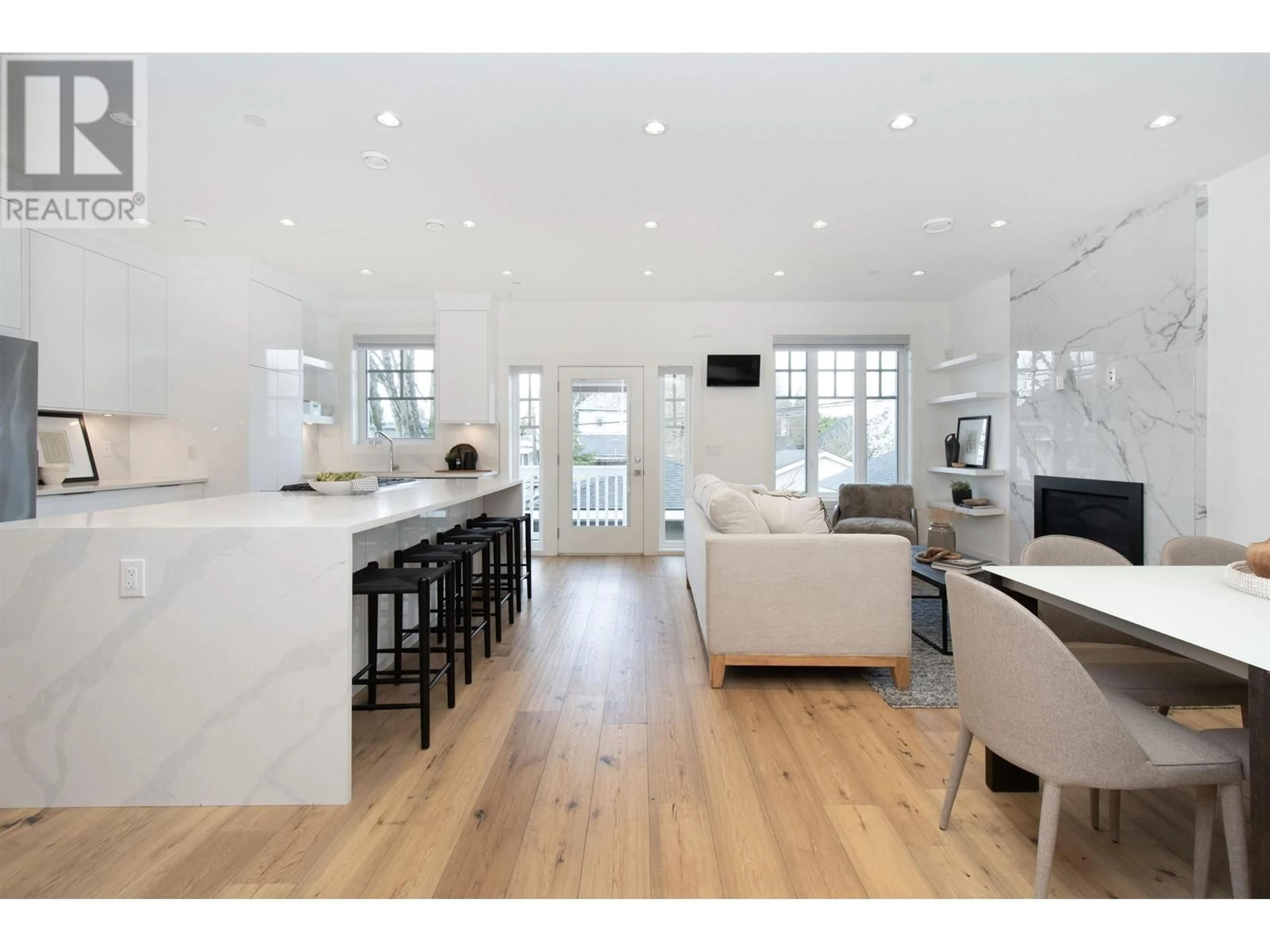 Open concept kitchen, wood/laminate floor for 849 13TH AVENUE, Vancouver British Columbia V5T2L4