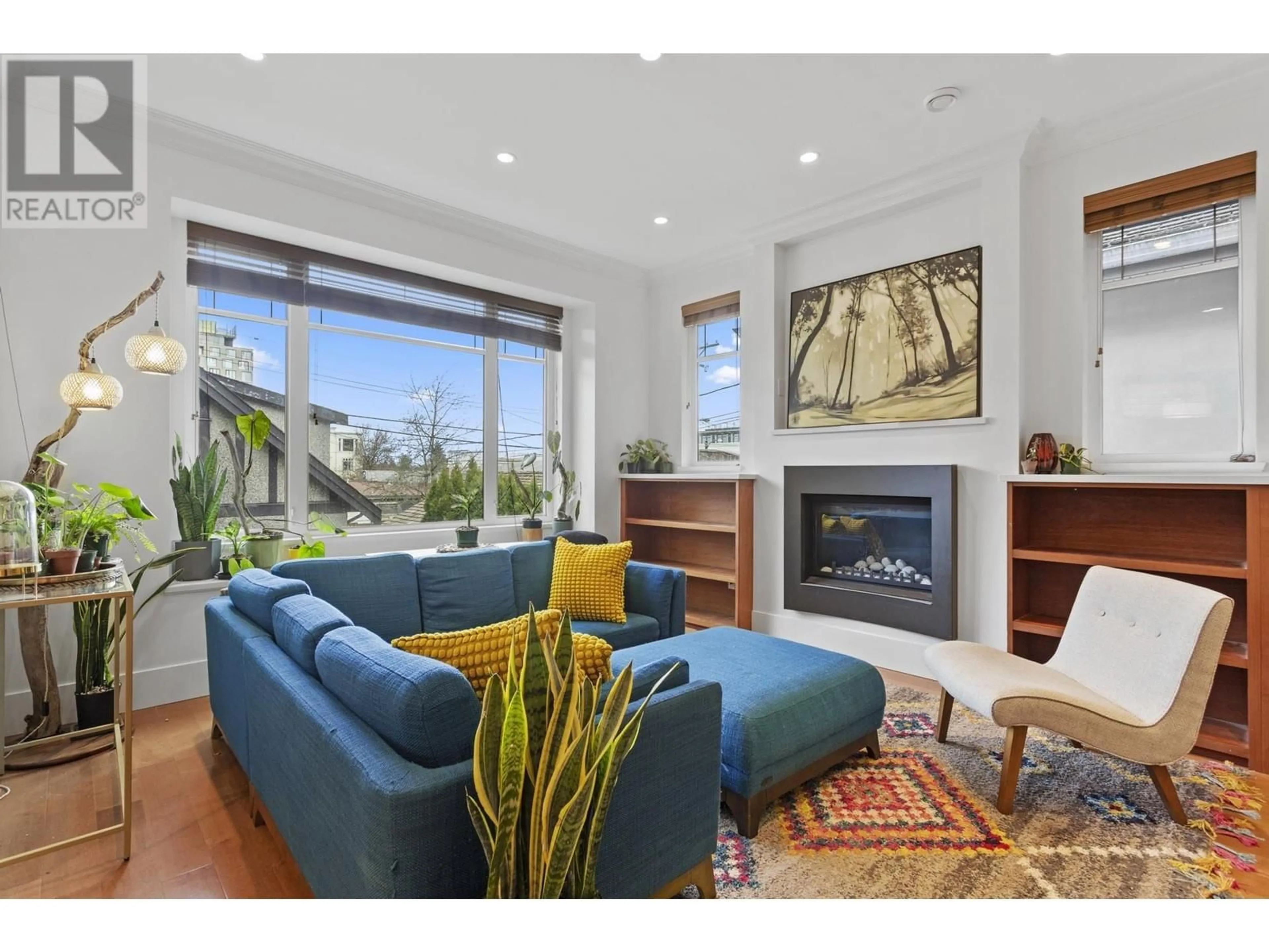 Living room with furniture, wood/laminate floor for 3729 11TH AVENUE, Vancouver British Columbia V6R2K7