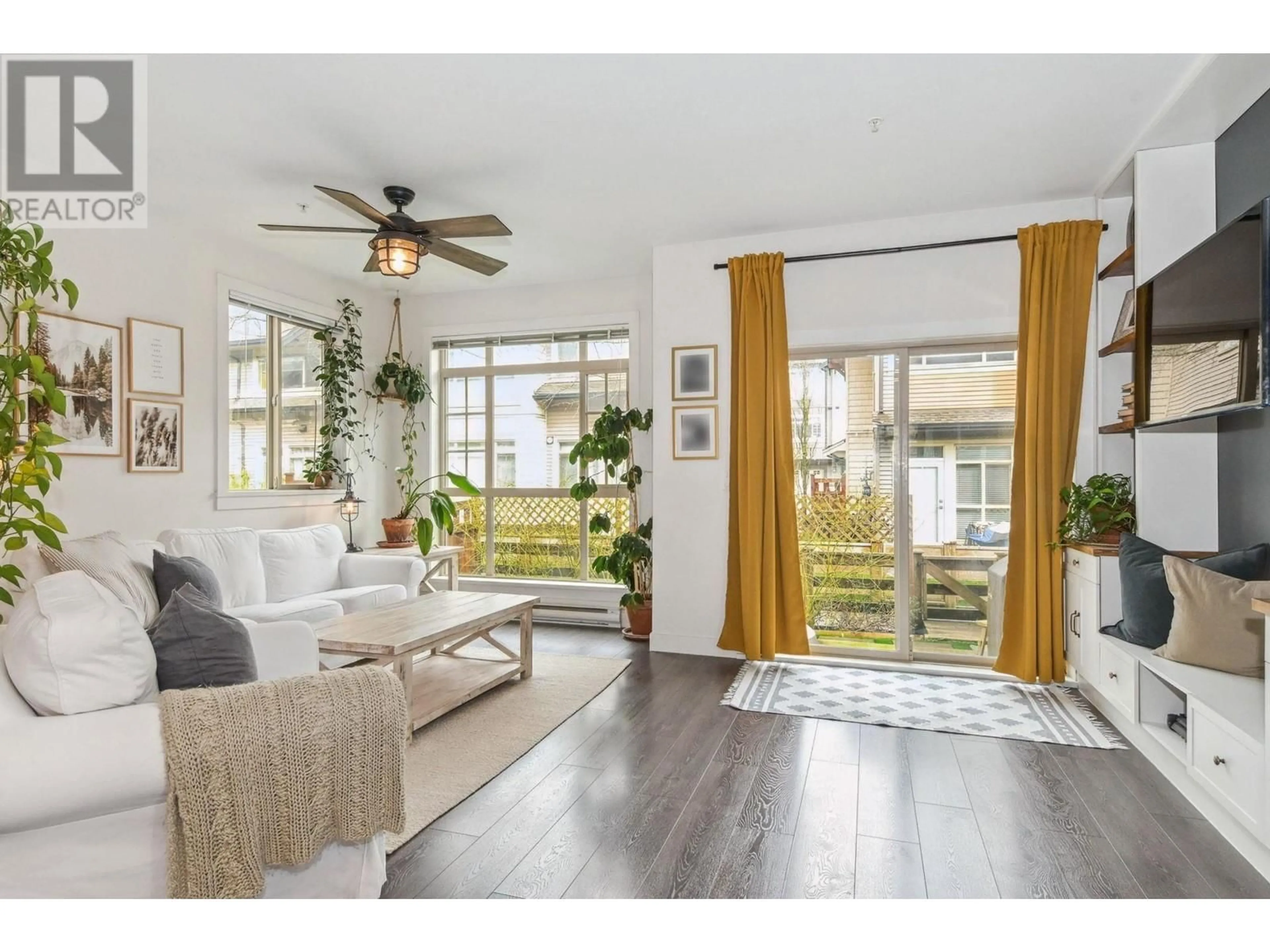 Living room with furniture, wood/laminate floor for 63 - 11305 240 STREET, Maple Ridge British Columbia V2W0J1