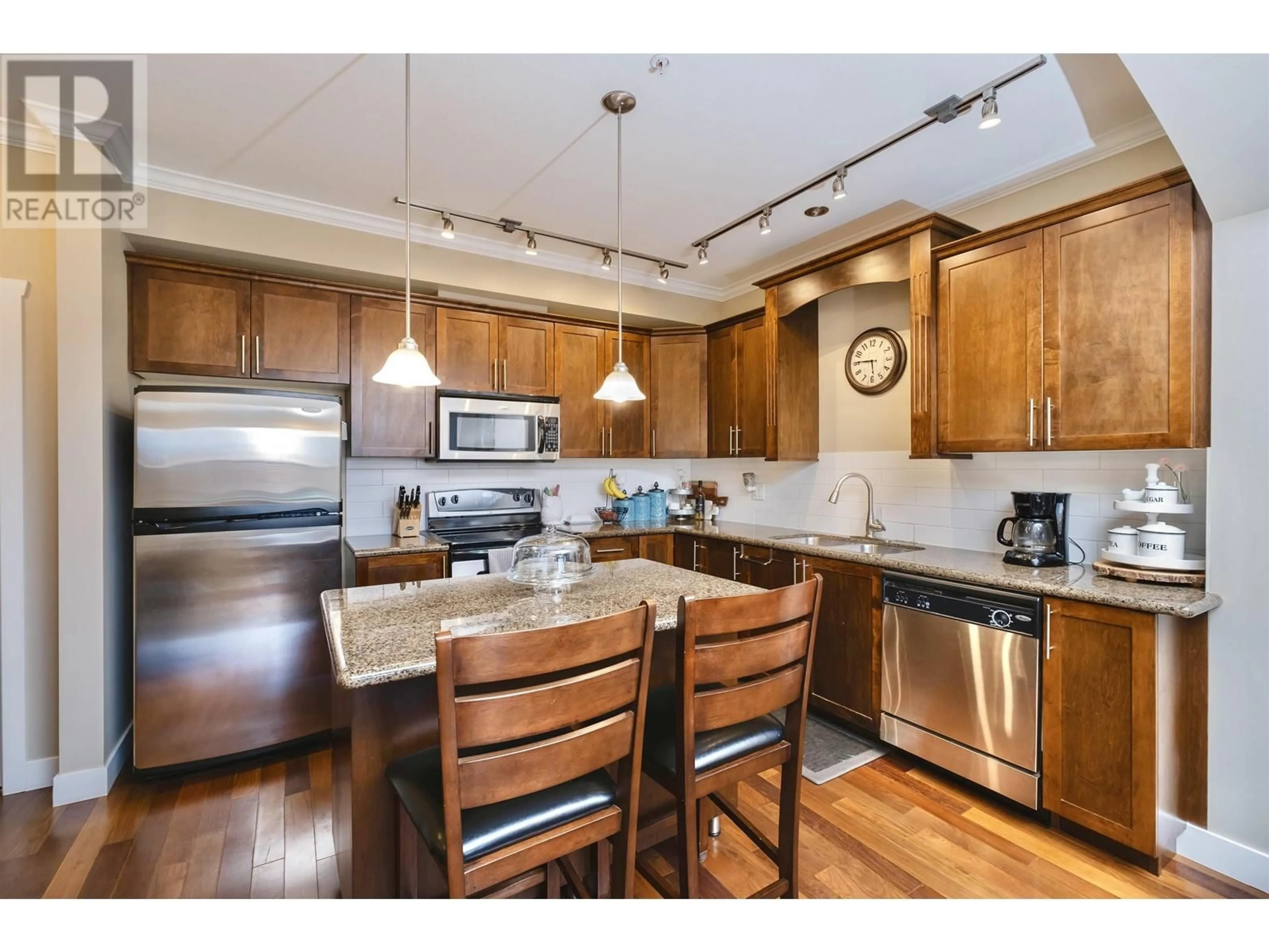 Open concept kitchen, wood/laminate floor for 206 - 2627 SHAUGHNESSY STREET, Port Coquitlam British Columbia V3C0E1