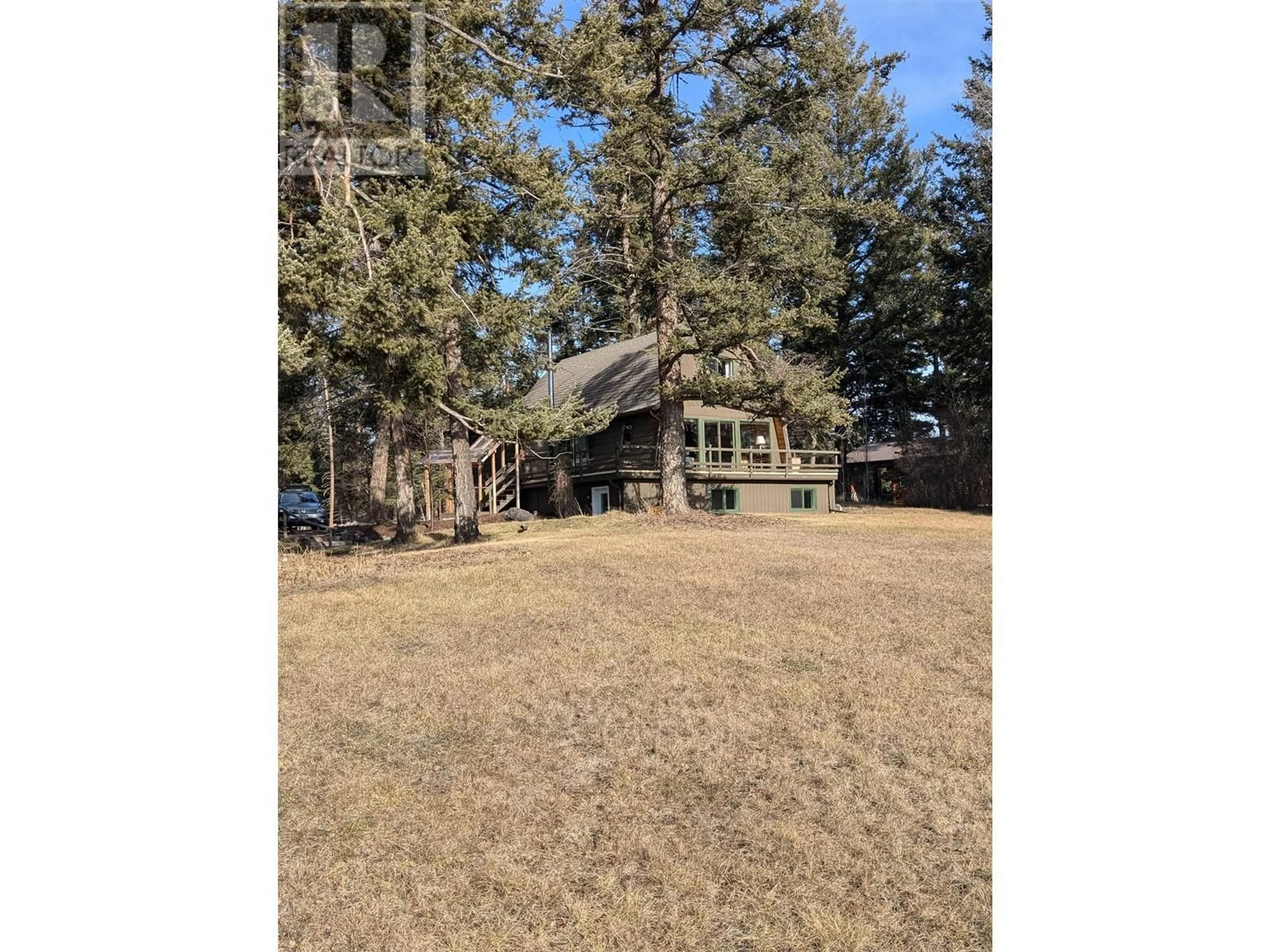 A pic from outside/outdoor area/front of a property/back of a property/a pic from drone, unknown for 5359 ANNAHAM CRESCENT, 108 Mile Ranch British Columbia V0K2Z0