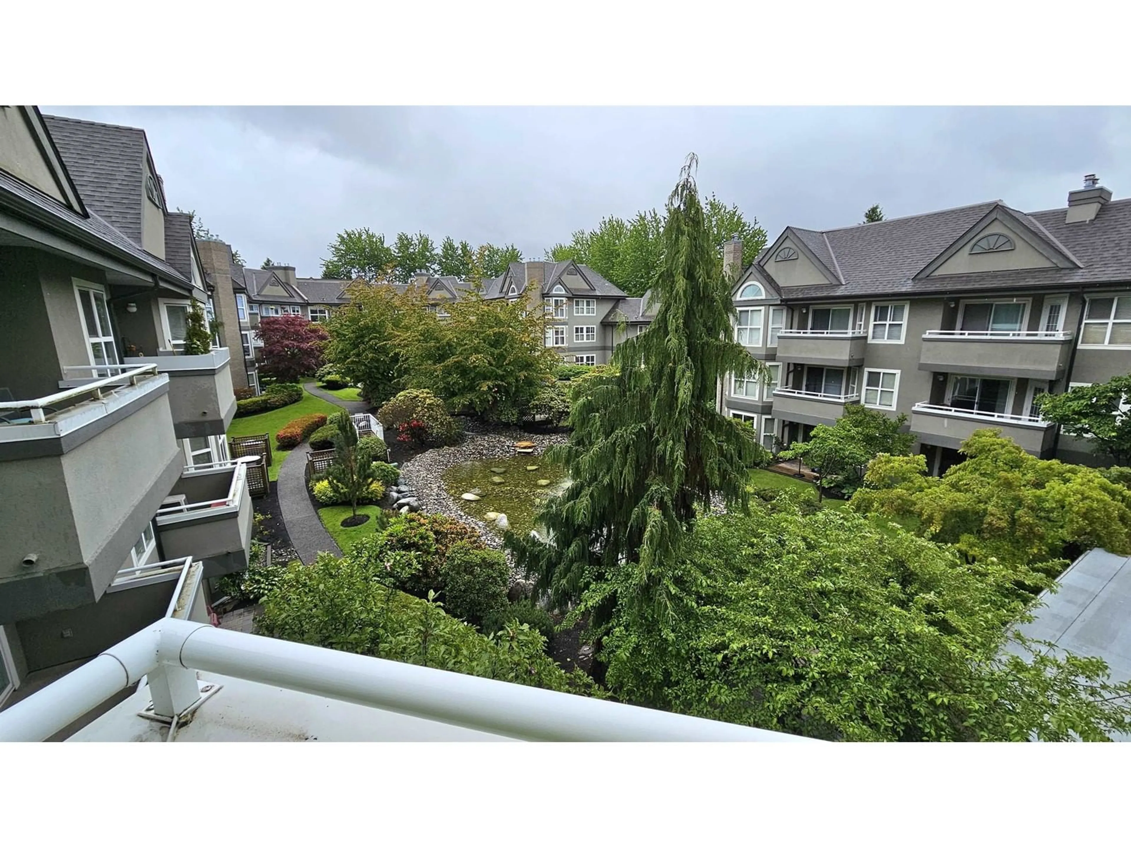A pic from outside/outdoor area/front of a property/back of a property/a pic from drone, city buildings view from balcony for 308 - 6557 121, Surrey British Columbia V3W1E7