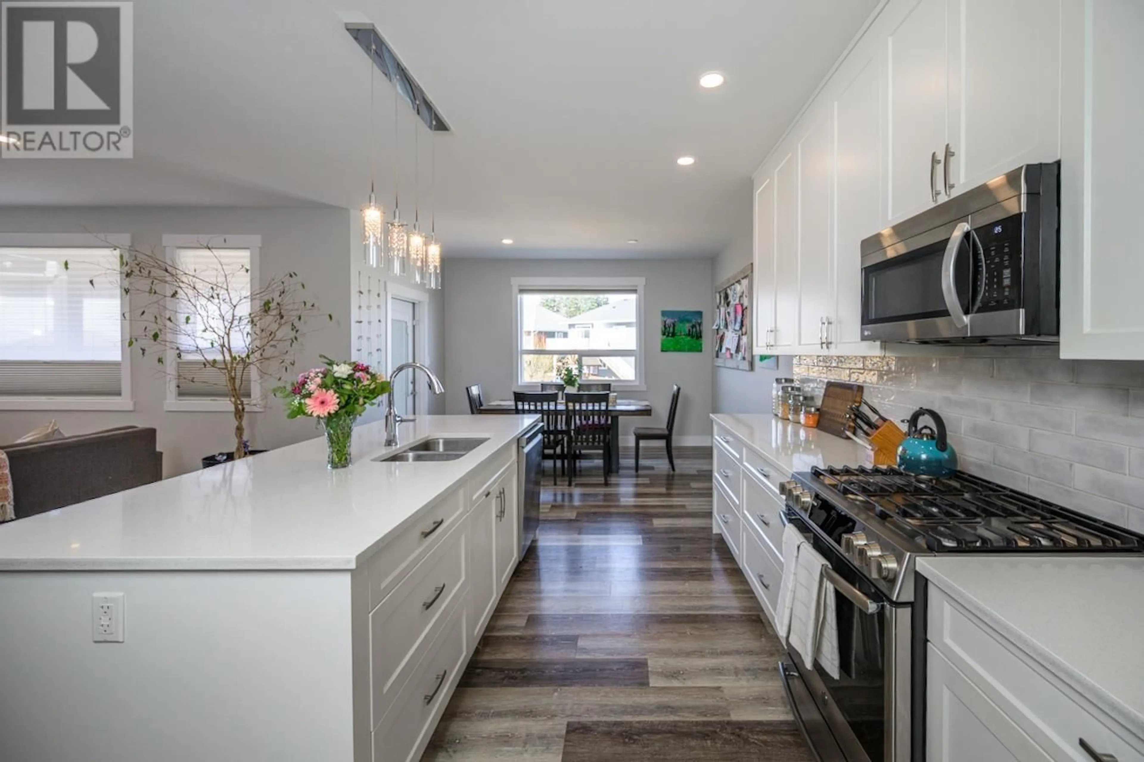 Open concept kitchen, ceramic/tile floor for 2958 ELLINGTON COURT, Prince George British Columbia V2N0G3