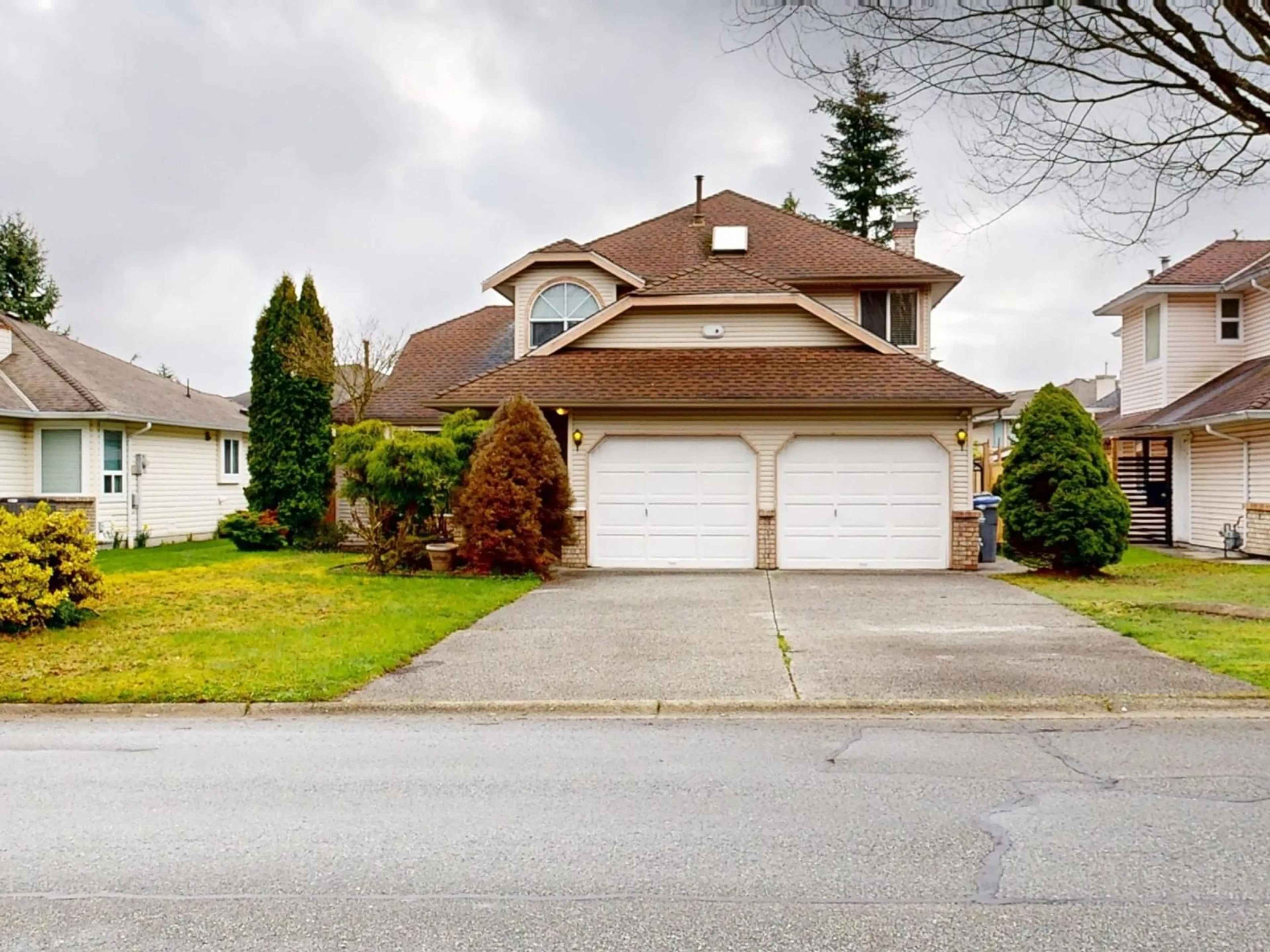 Home with vinyl exterior material, street for 8514 164A, Surrey British Columbia V4N3G8