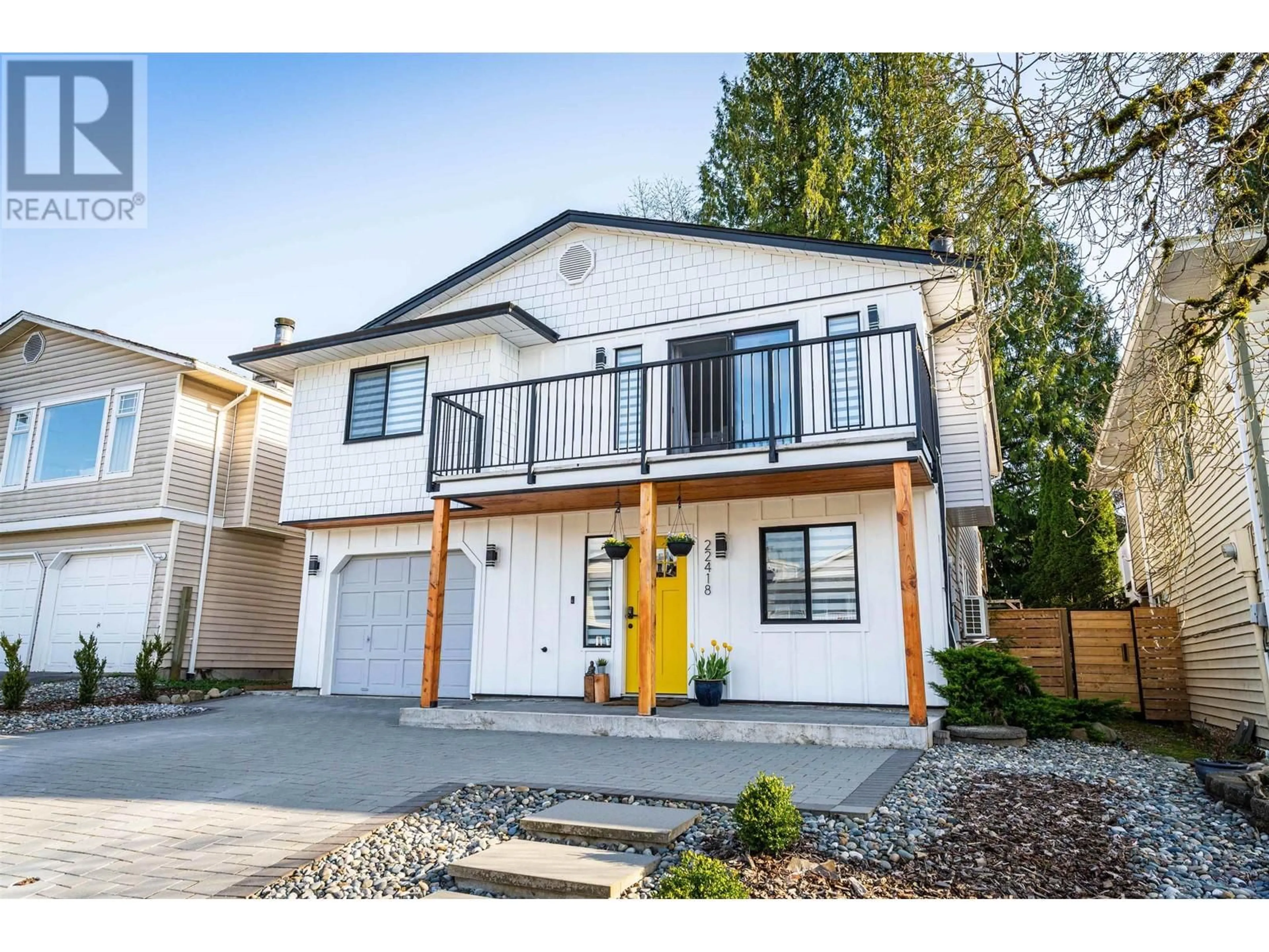 Home with vinyl exterior material, street for 22418 125TH AVENUE, Maple Ridge British Columbia V2X9N6