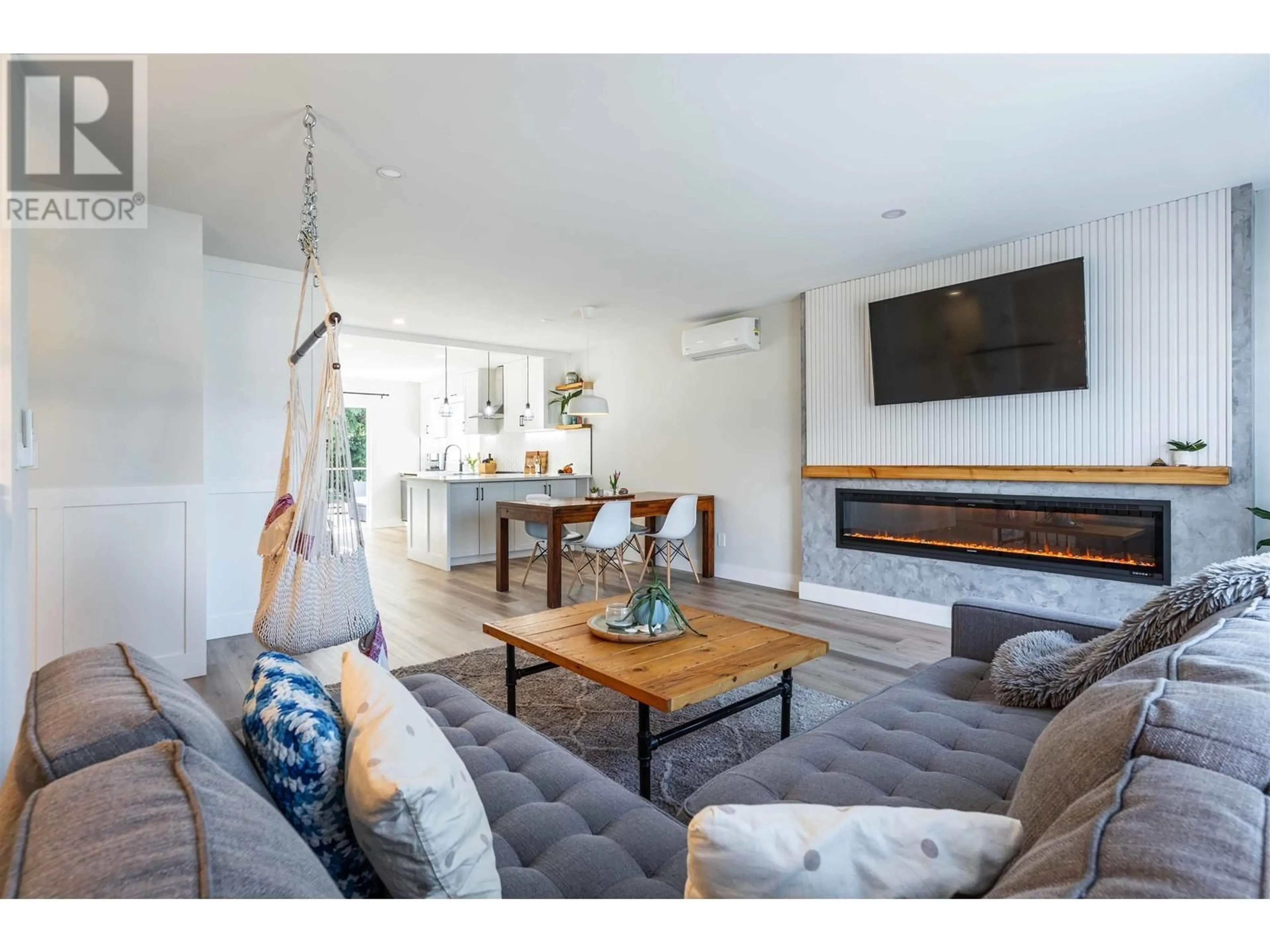 Living room with furniture, wood/laminate floor for 22418 125TH AVENUE, Maple Ridge British Columbia V2X9N6