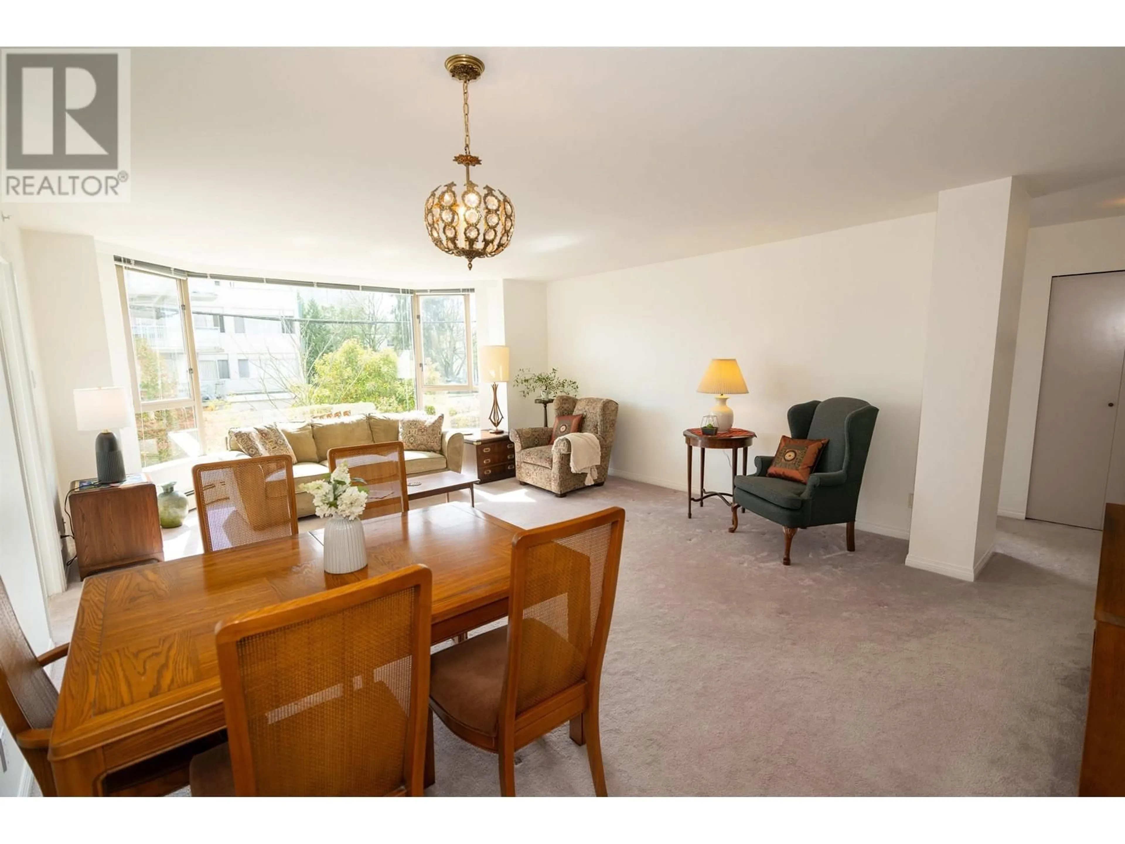 Dining room, wood/laminate floor for 203 - 2108 38TH AVENUE, Vancouver British Columbia V6M1R9