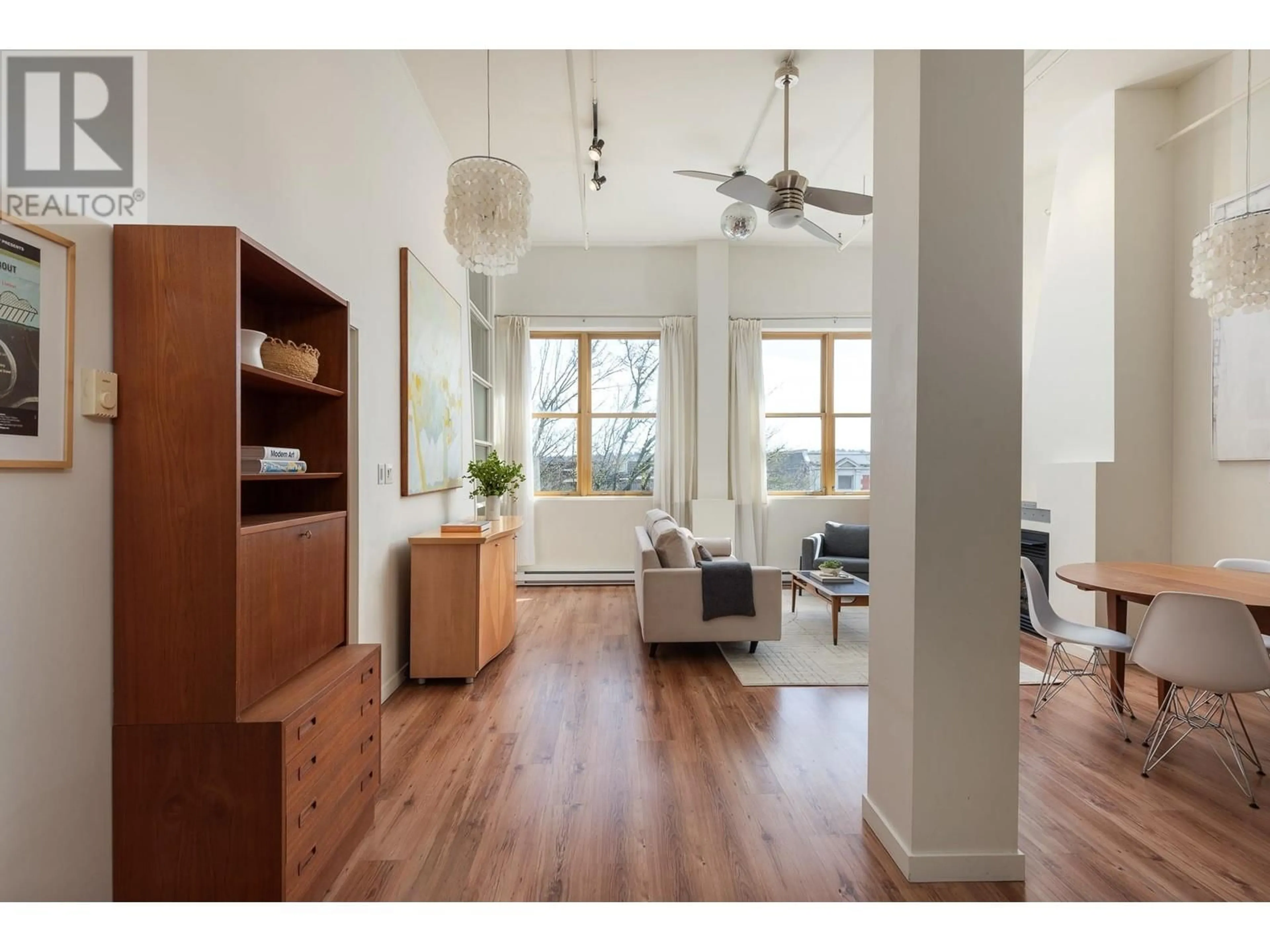 Living room with furniture, wood/laminate floor for 312 - 549 COLUMBIA STREET, New Westminster British Columbia V3L1B3