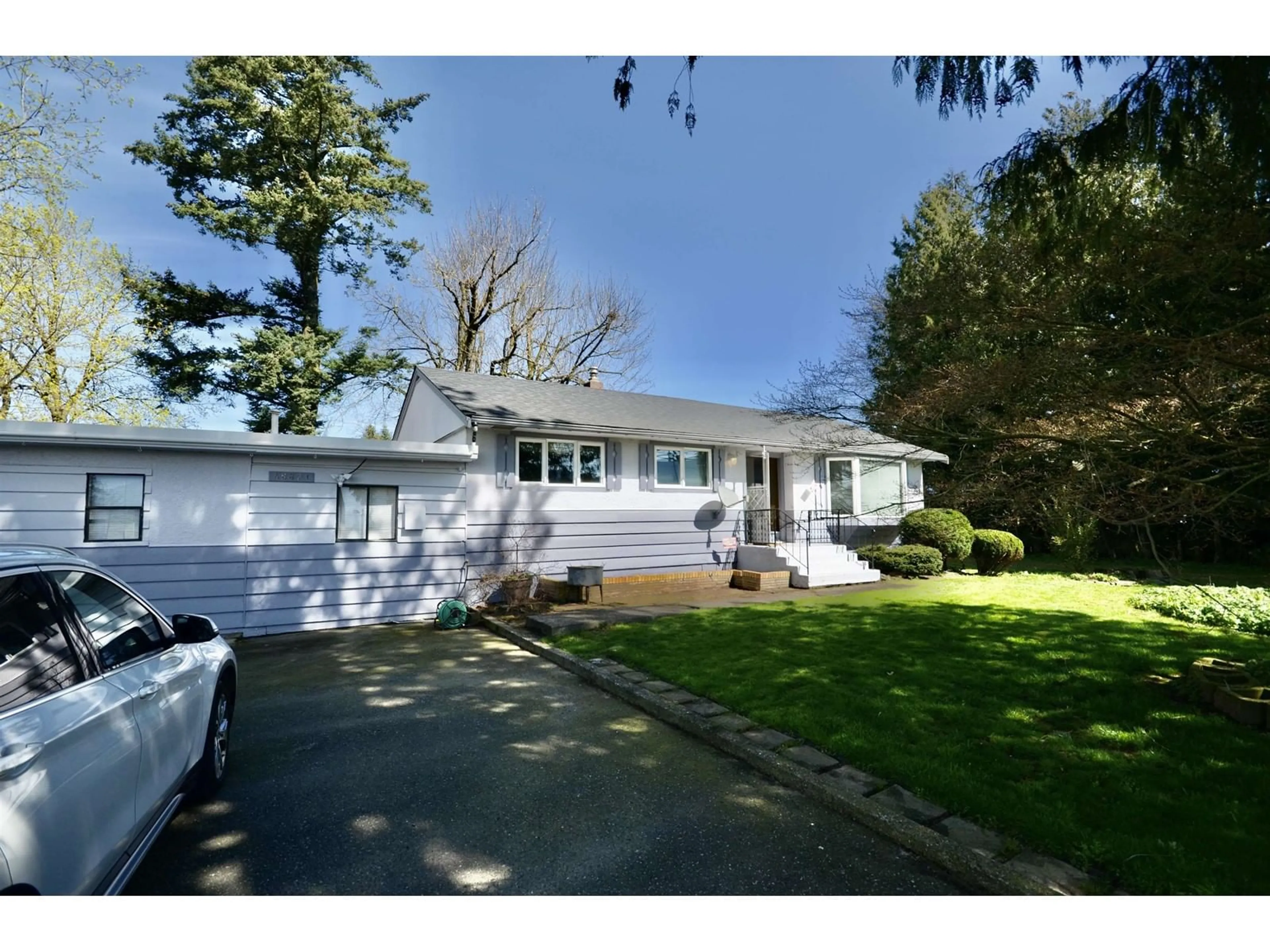 Home with vinyl exterior material, street for 48821 YALE ROAD, Chilliwack British Columbia V4Z0B1