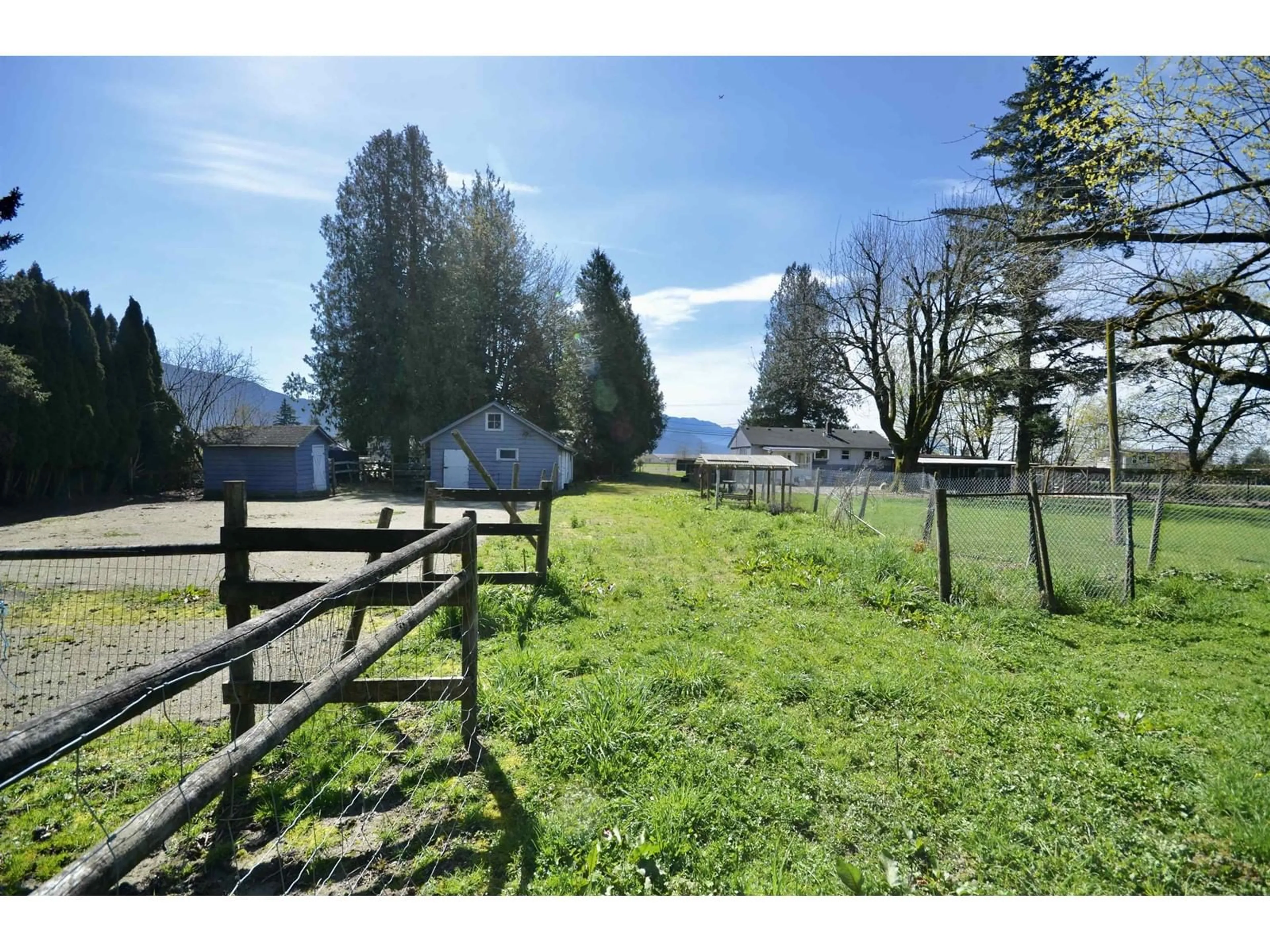 A pic from outside/outdoor area/front of a property/back of a property/a pic from drone, mountain view for 48821 YALE ROAD, Chilliwack British Columbia V4Z0B1