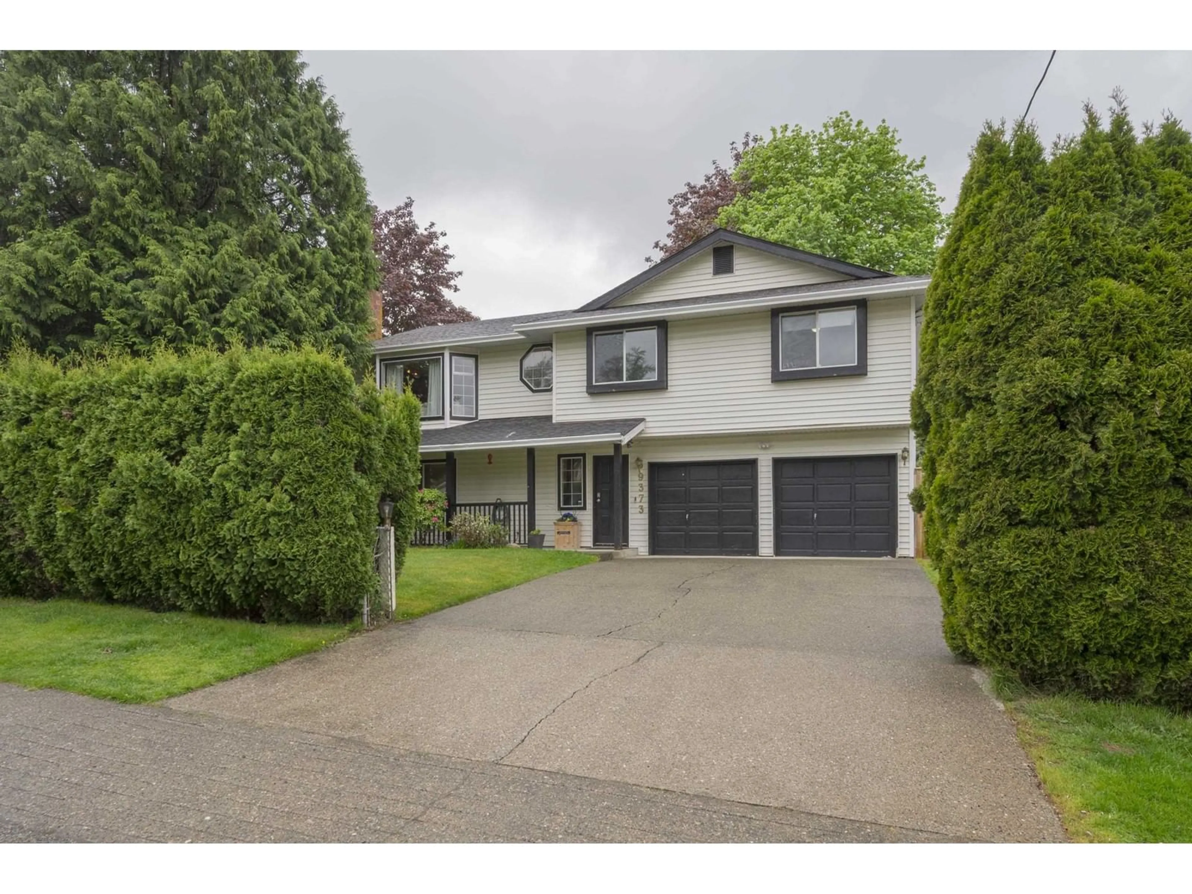 Home with vinyl exterior material, street for 9373 210, Langley British Columbia V1M1W2