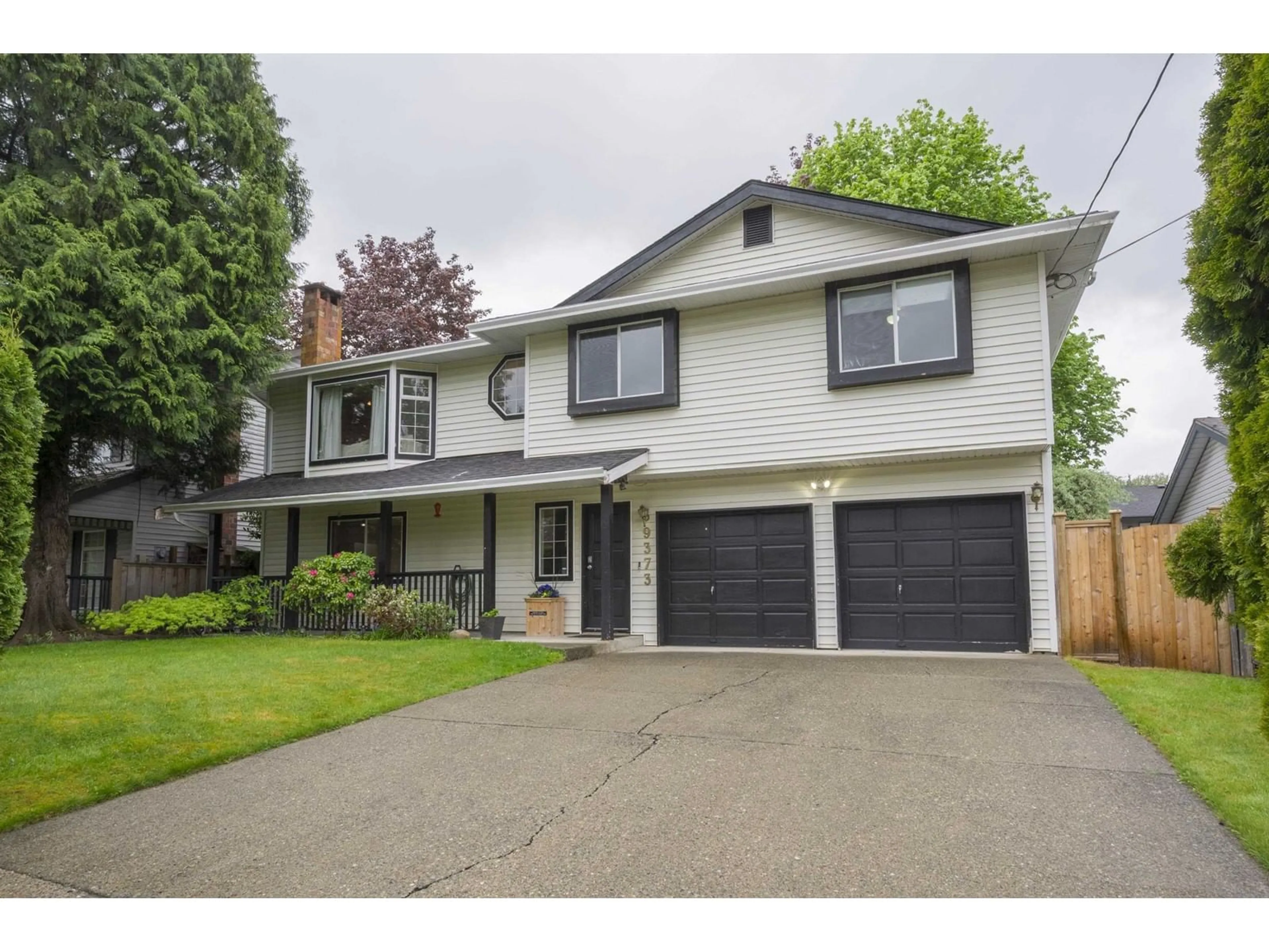 Home with vinyl exterior material, street for 9373 210, Langley British Columbia V1M1W2