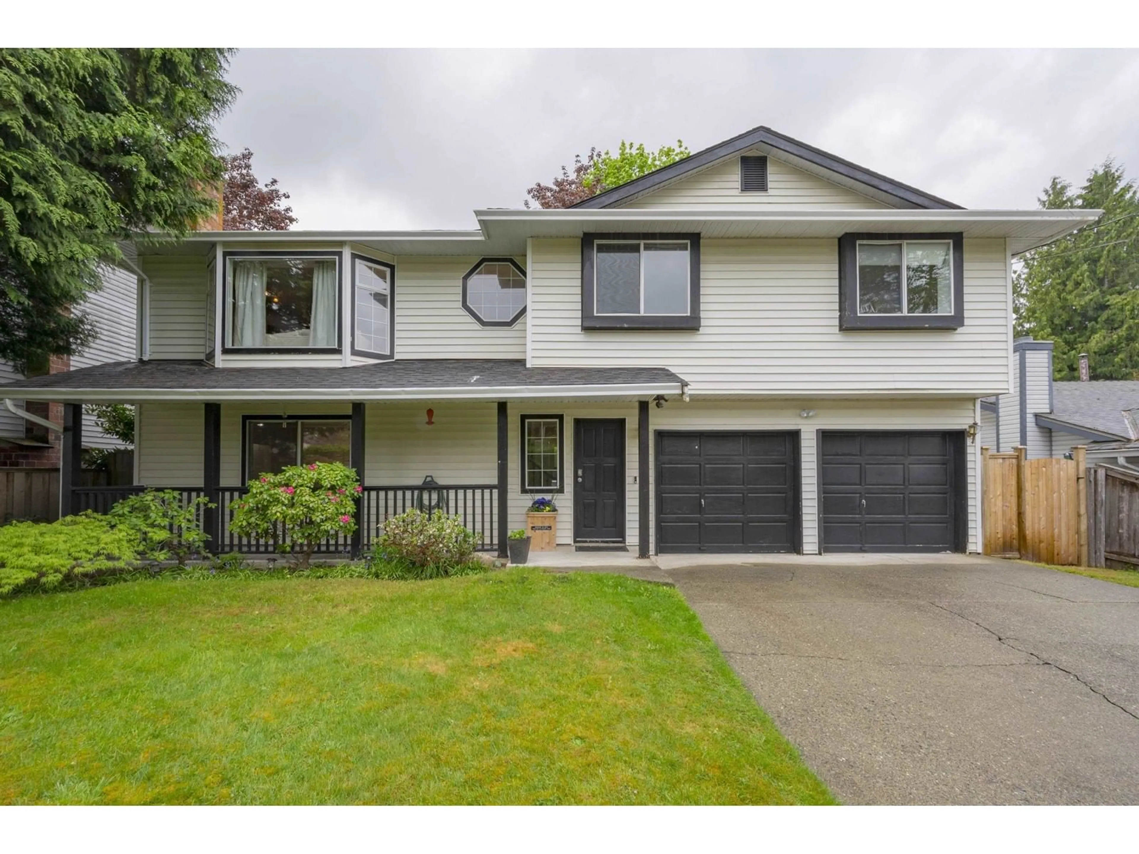 Home with vinyl exterior material, street for 9373 210, Langley British Columbia V1M1W2