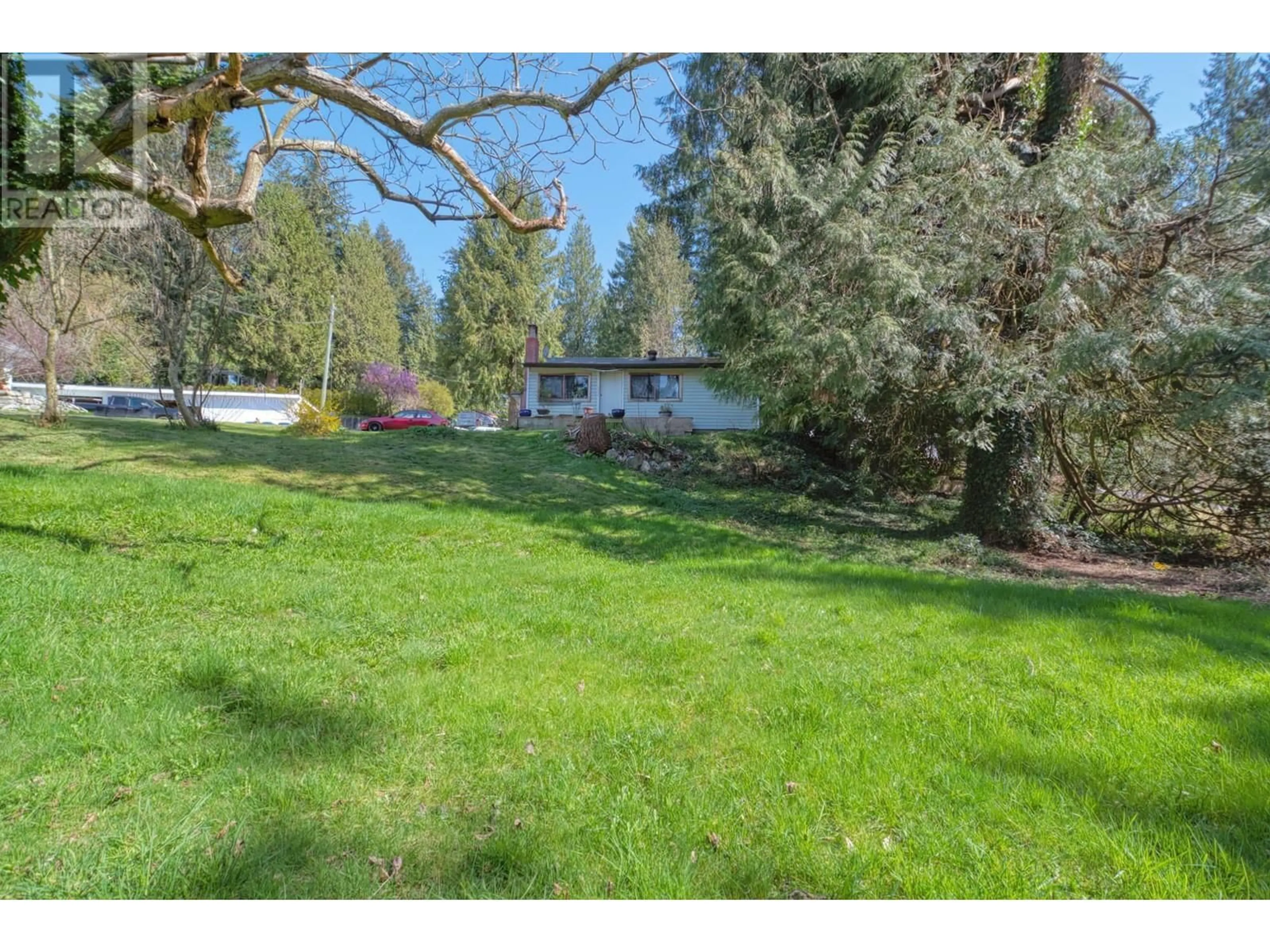A pic from outside/outdoor area/front of a property/back of a property/a pic from drone, forest/trees view for 5056B SUNSHINE COAST HIGHWAY, Sechelt British Columbia V7Z0B9