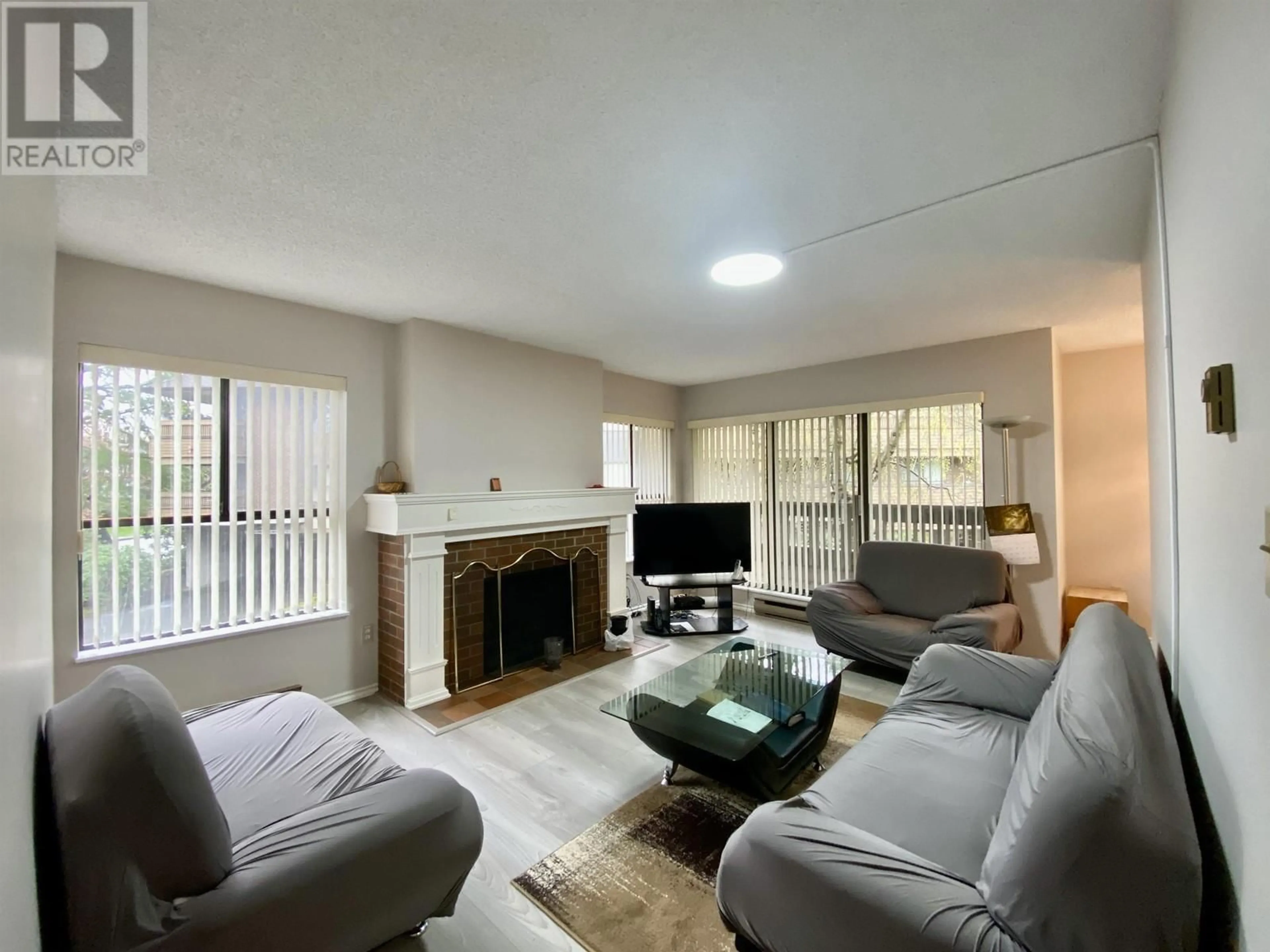 Living room with furniture, unknown for 101 - 7411 MINORU BOULEVARD, Richmond British Columbia V6Y1Z3