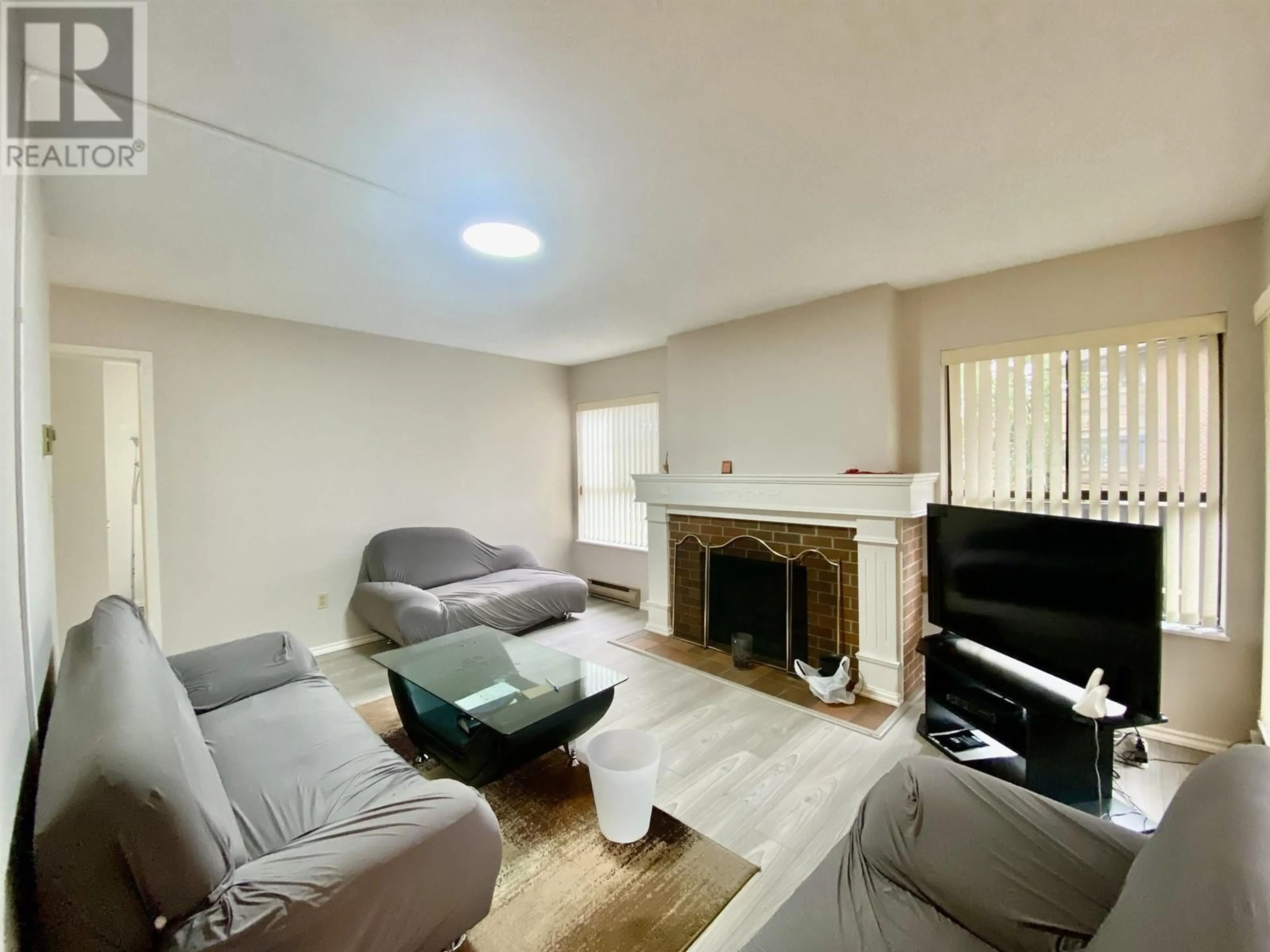 Living room with furniture, unknown for 101 - 7411 MINORU BOULEVARD, Richmond British Columbia V6Y1Z3
