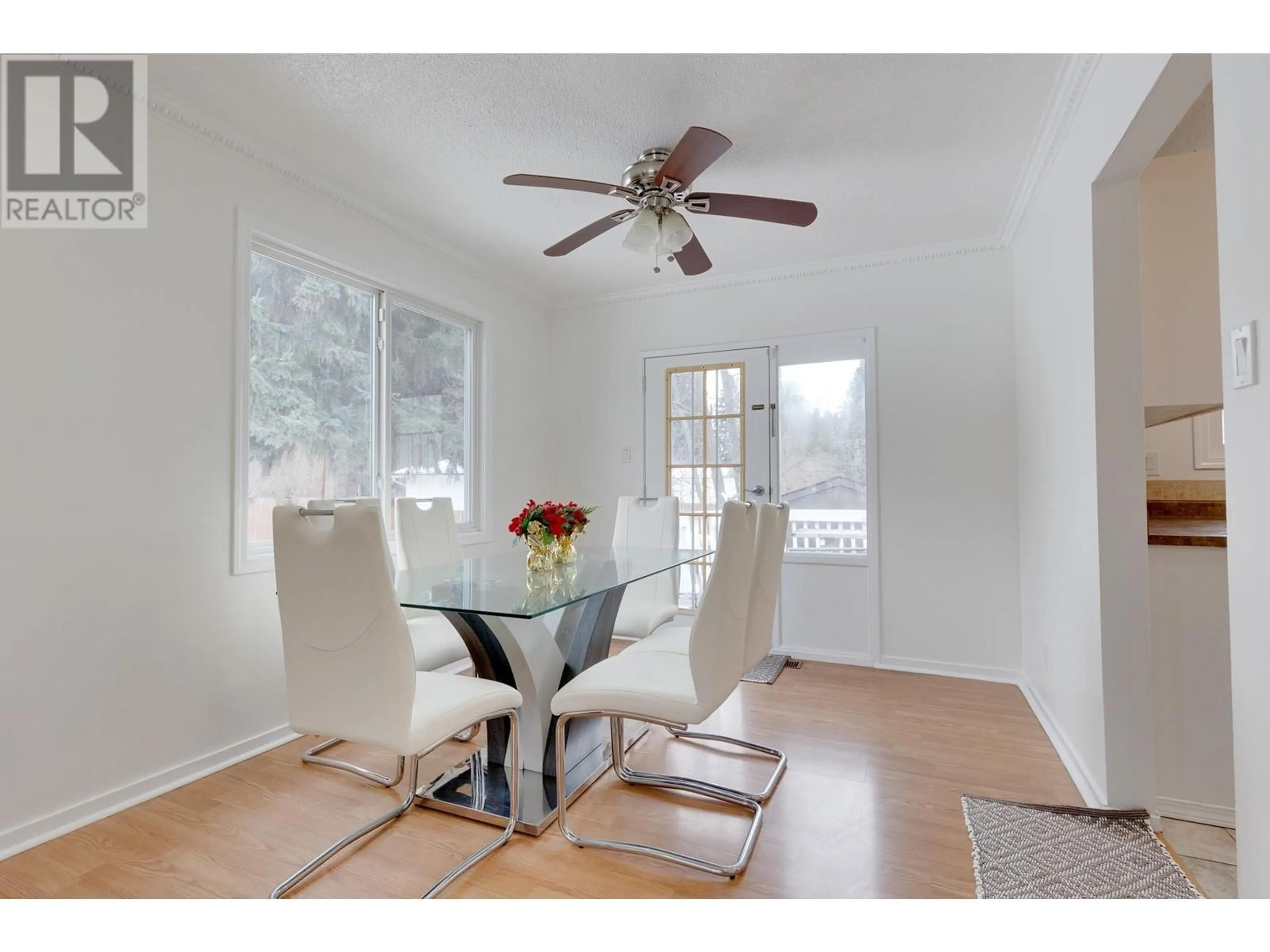 Dining room, wood/laminate floor for 242 FERN CRESCENT, Prince George British Columbia V2N1J6