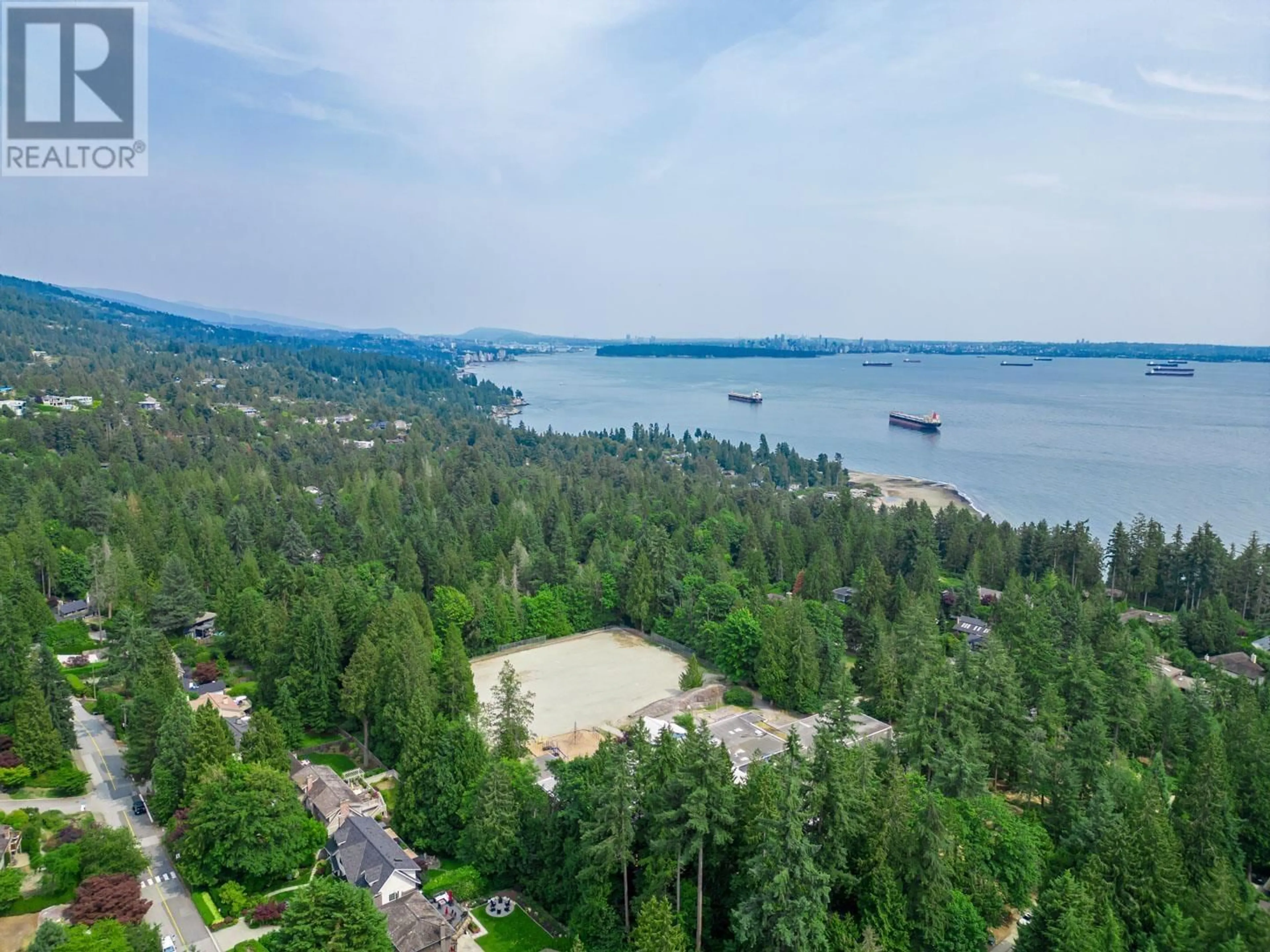 A pic from outside/outdoor area/front of a property/back of a property/a pic from drone, water/lake/river/ocean view for 4621 CAULFEILD DRIVE, West Vancouver British Columbia V7W1E9
