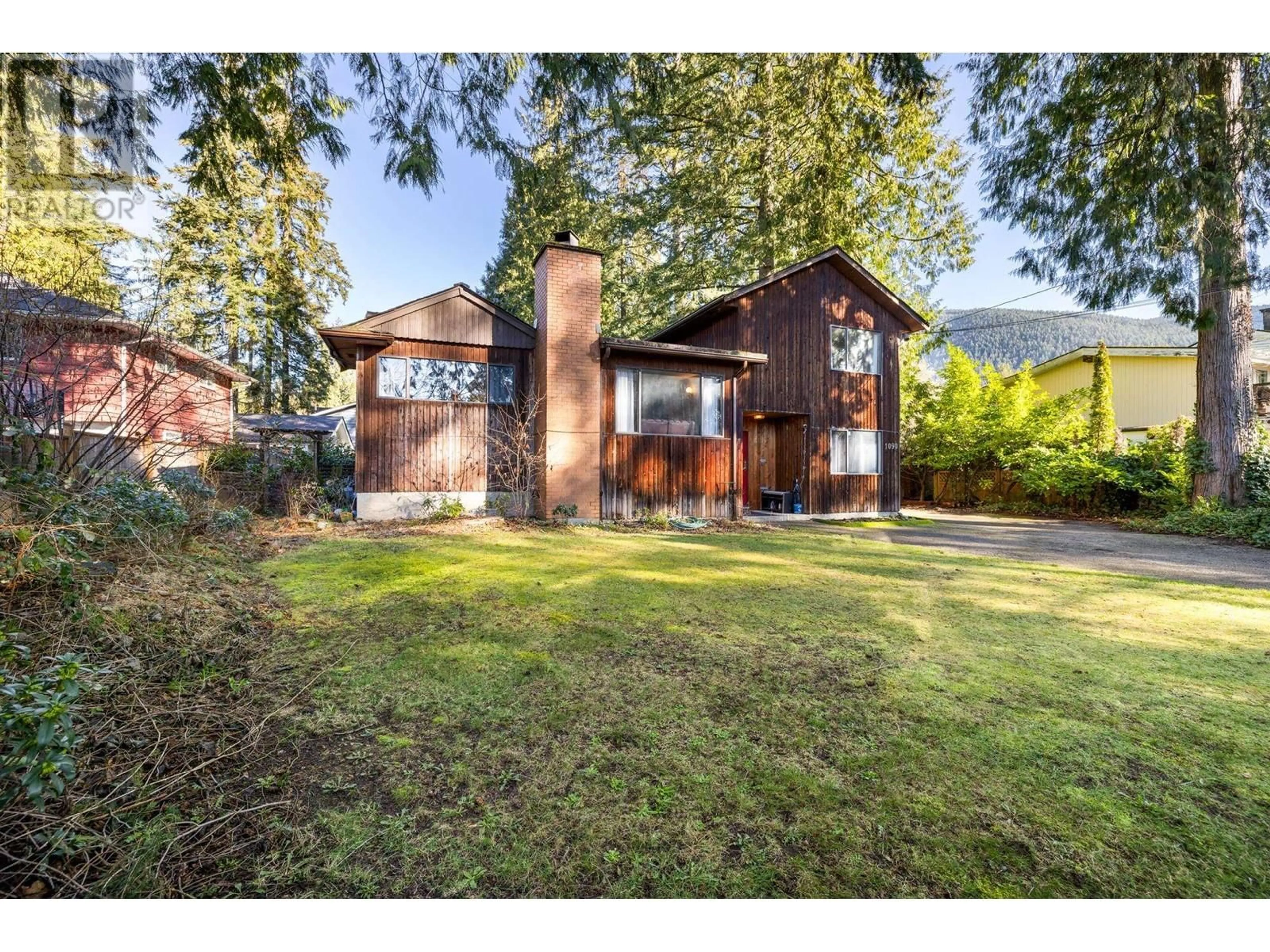 A pic from outside/outdoor area/front of a property/back of a property/a pic from drone, street for 1090 HANDSWORTH ROAD, North Vancouver British Columbia V7R2A6