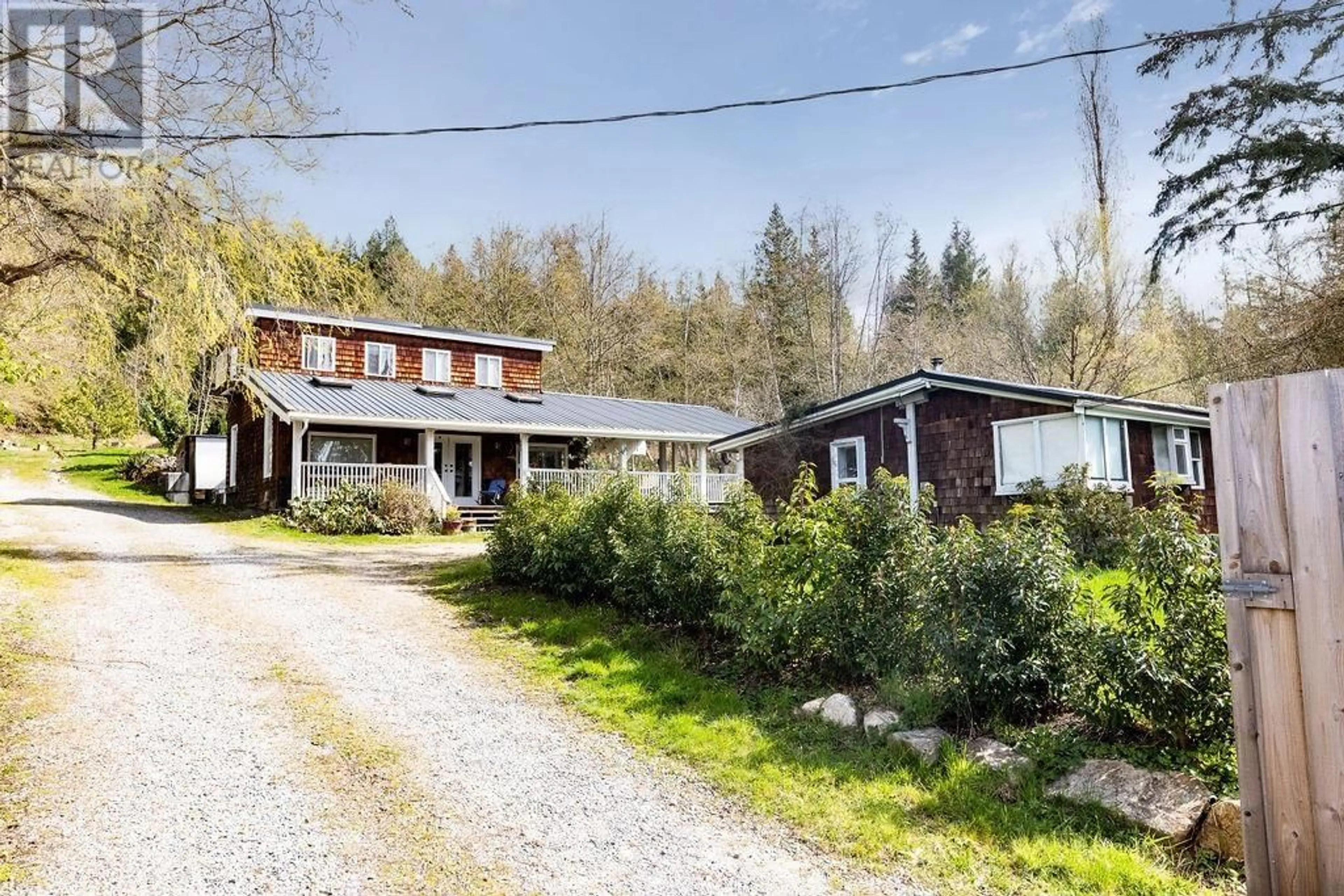 A pic from outside/outdoor area/front of a property/back of a property/a pic from drone, street for 2470 SUNSHINE COAST HIGHWAY, Roberts Creek British Columbia V0N2W5
