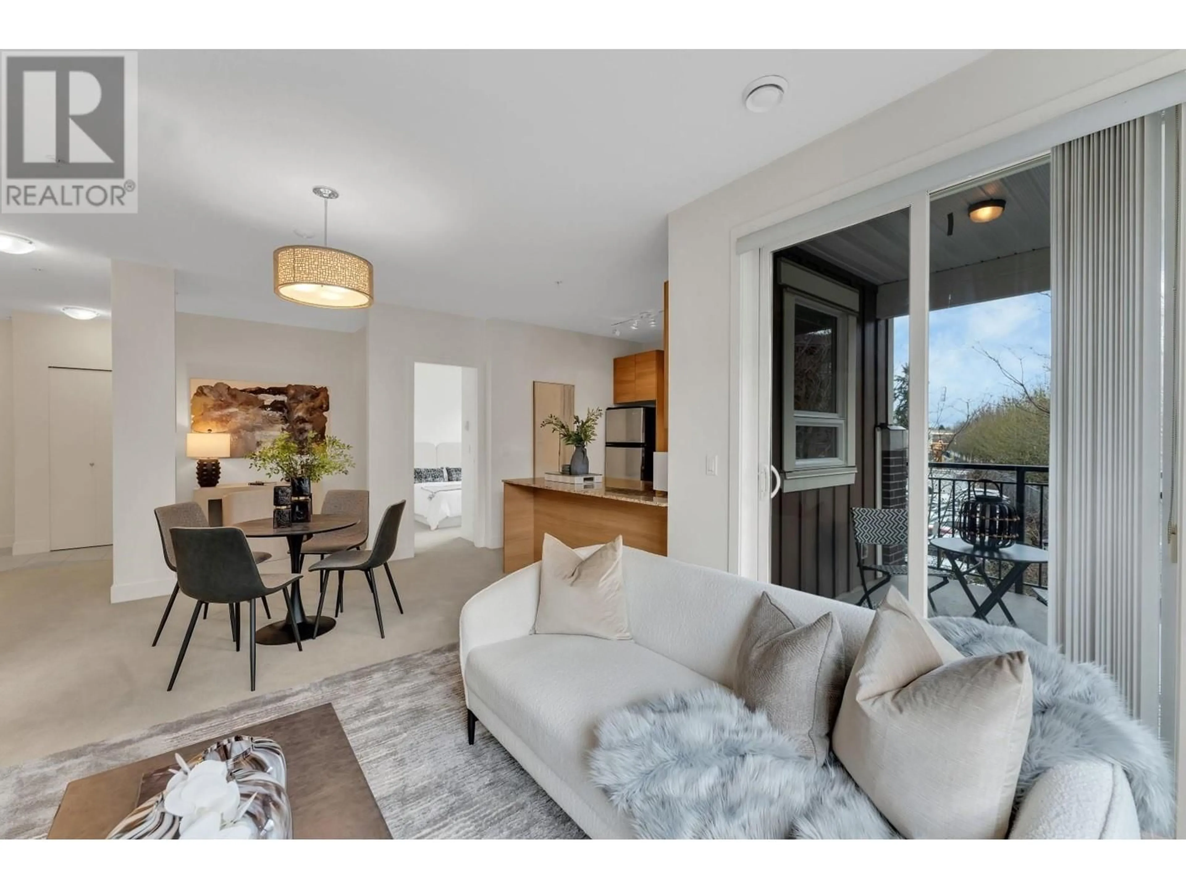 Living room with furniture, unknown for 207 - 5788 SIDLEY STREET, Burnaby British Columbia V5J5E5