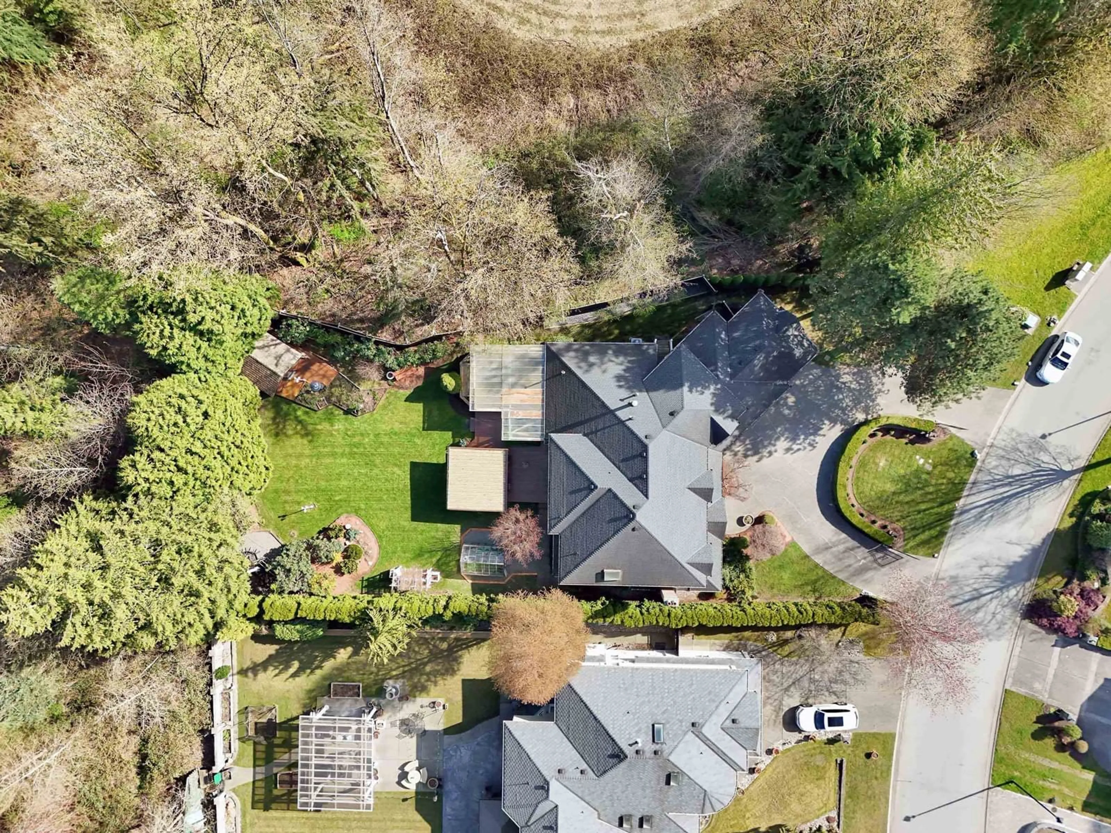 A pic from outside/outdoor area/front of a property/back of a property/a pic from drone, street for 7942 145TH, Surrey British Columbia V3S8C2