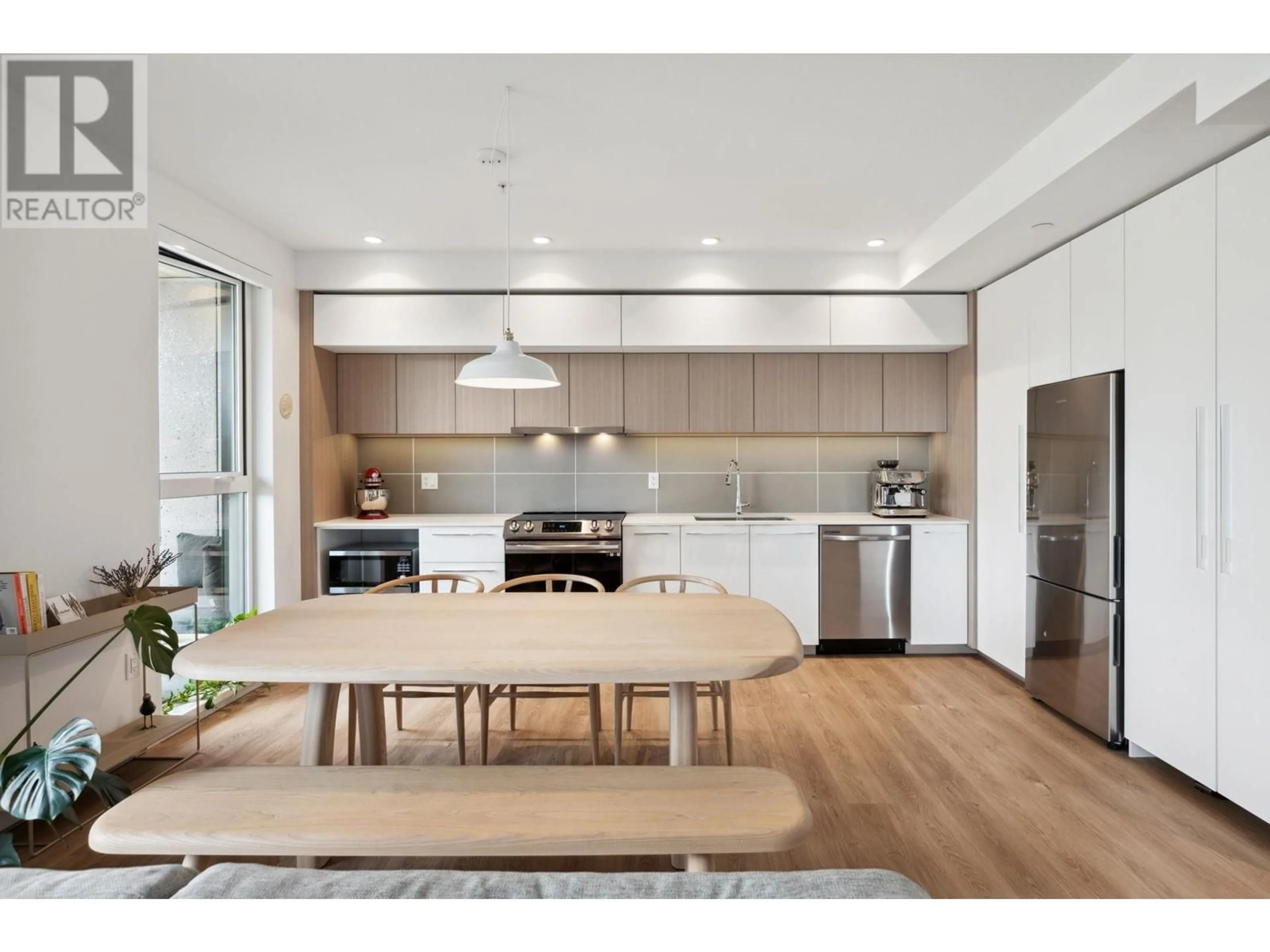 Open concept kitchen, wood/laminate floor for 407 - 9580 TOWER ROAD, Burnaby British Columbia V5A0G5