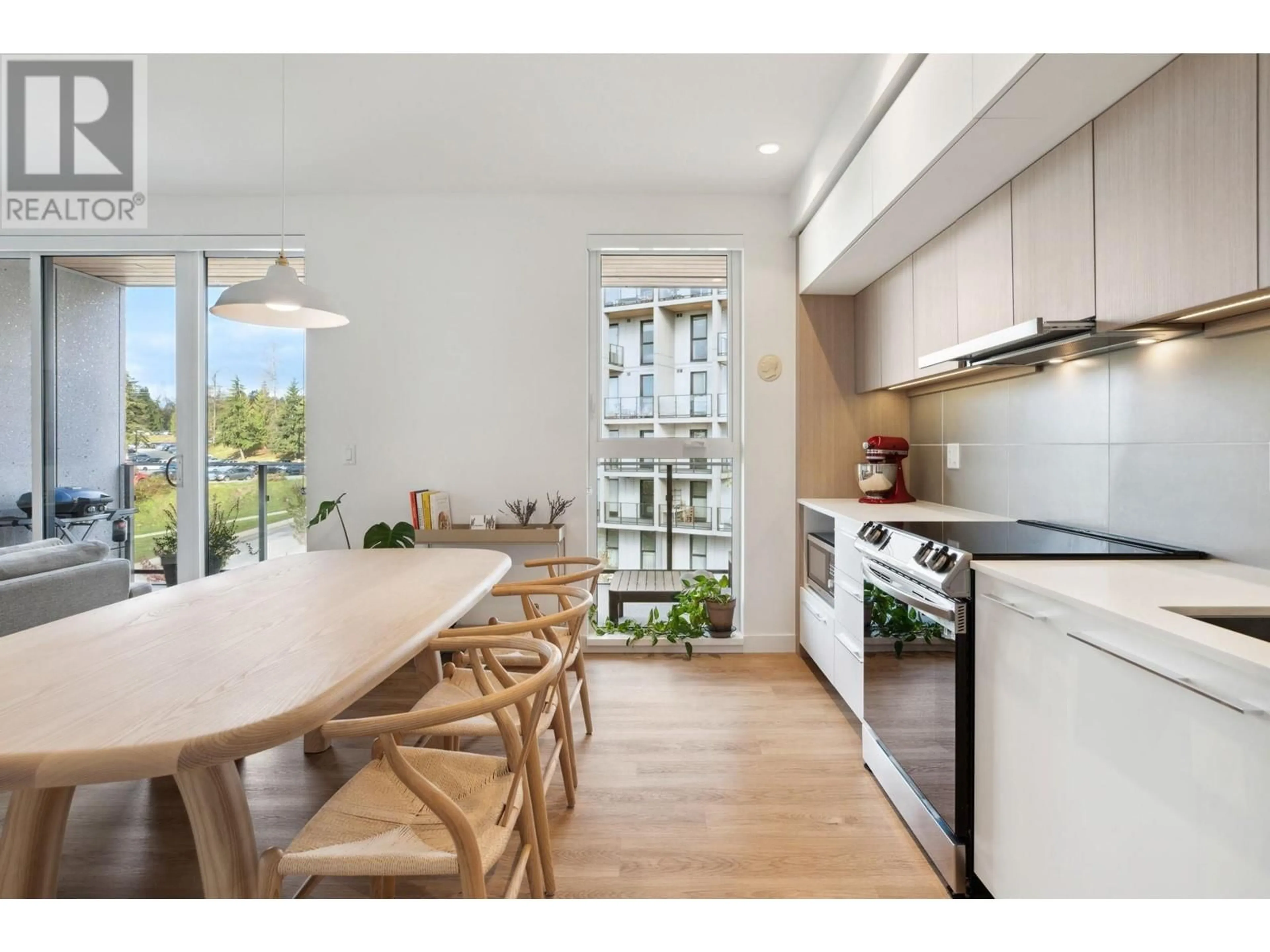 Open concept kitchen, wood/laminate floor for 407 - 9580 TOWER ROAD, Burnaby British Columbia V5A0G5