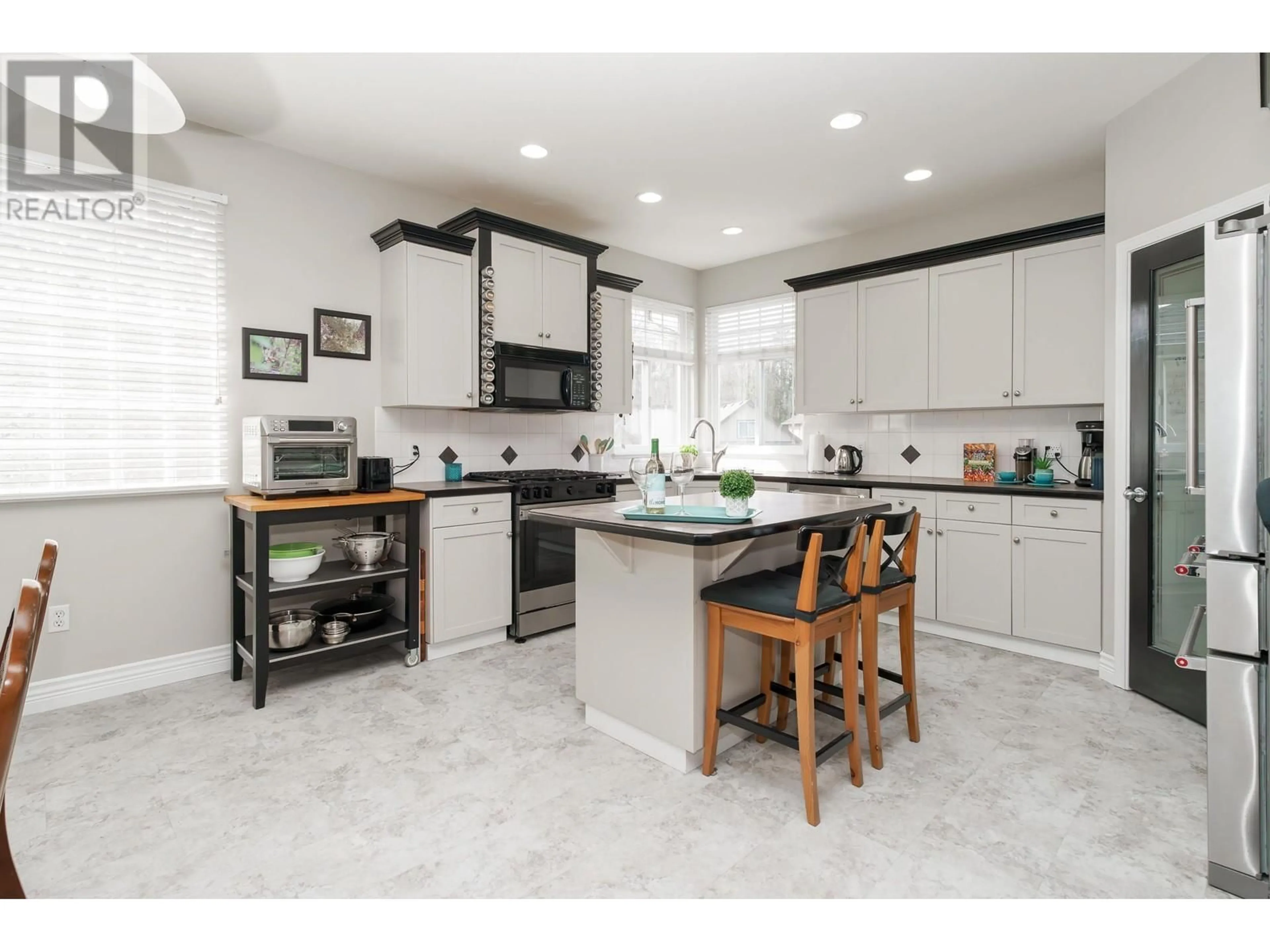 Open concept kitchen, ceramic/tile floor for 11066 236A STREET, Maple Ridge British Columbia V2W2A1