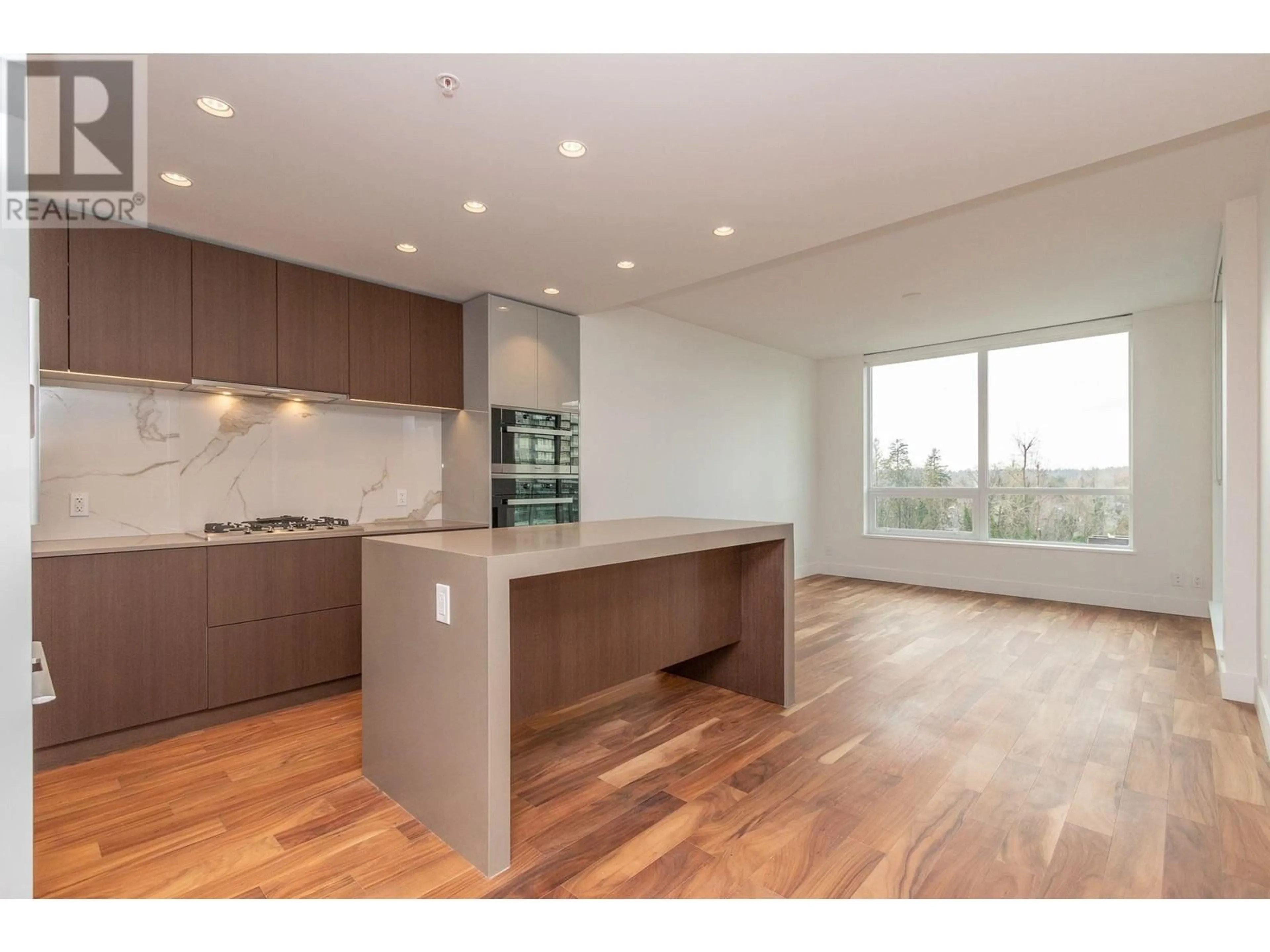 Open concept kitchen, wood/laminate floor for 605 - 1675 LIONS GATE LANE, North Vancouver British Columbia V7P3B4