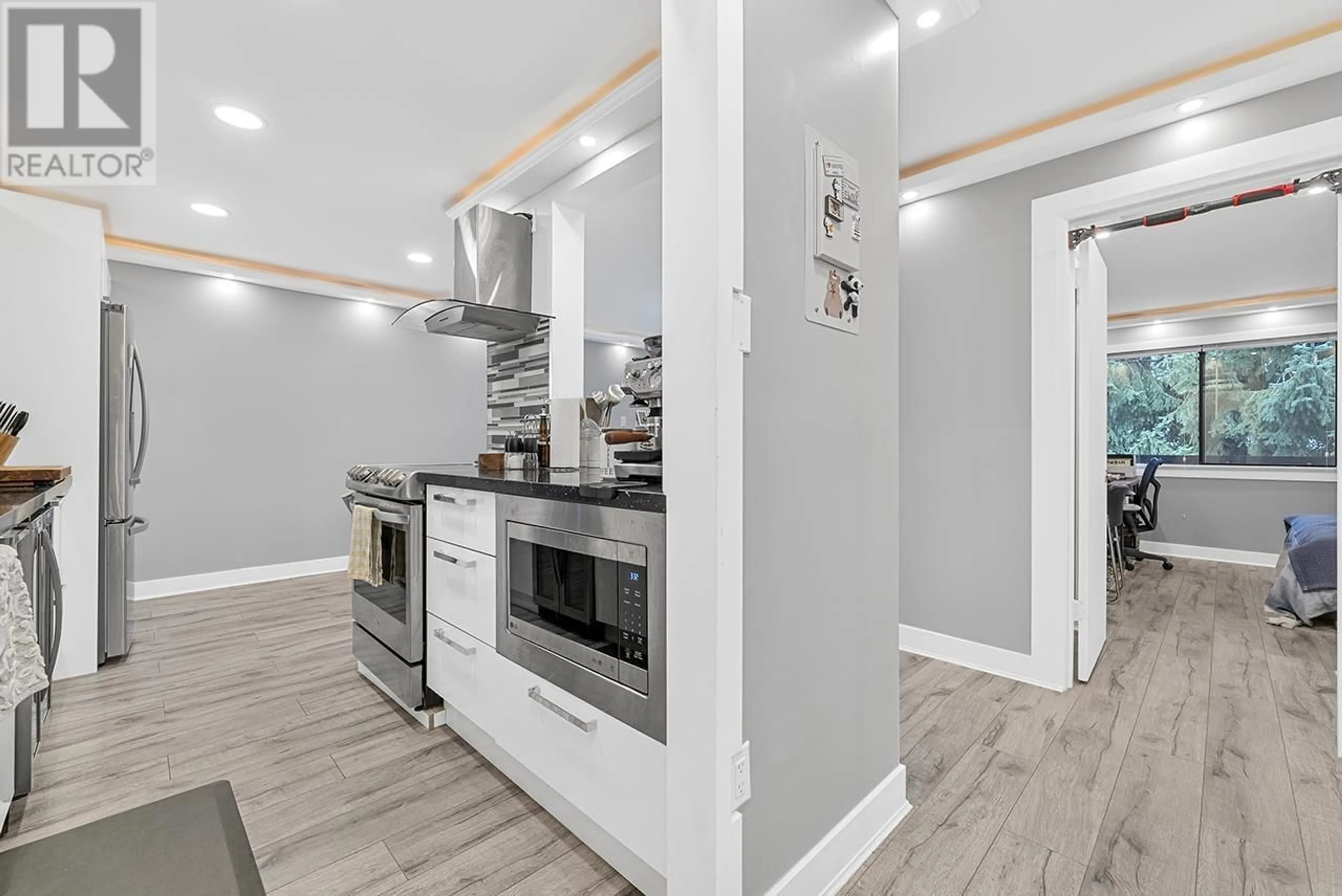 Open concept kitchen, wood/laminate floor for 306 - 7180 LINDEN AVENUE, Burnaby British Columbia V5E3G6