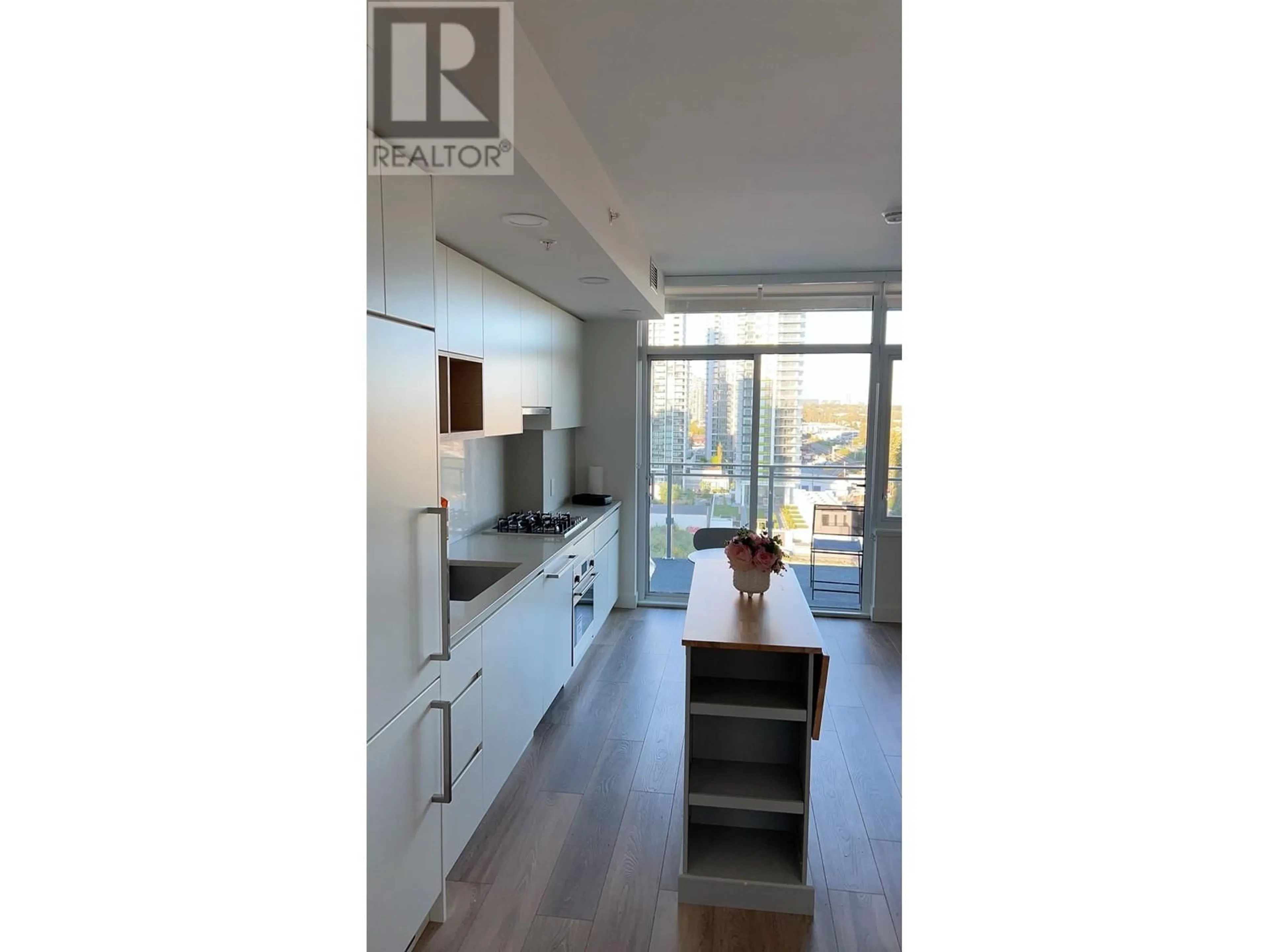 Open concept kitchen, wood/laminate floor for 1003 - 4433 ALASKA STREET, Burnaby British Columbia V5C5T3