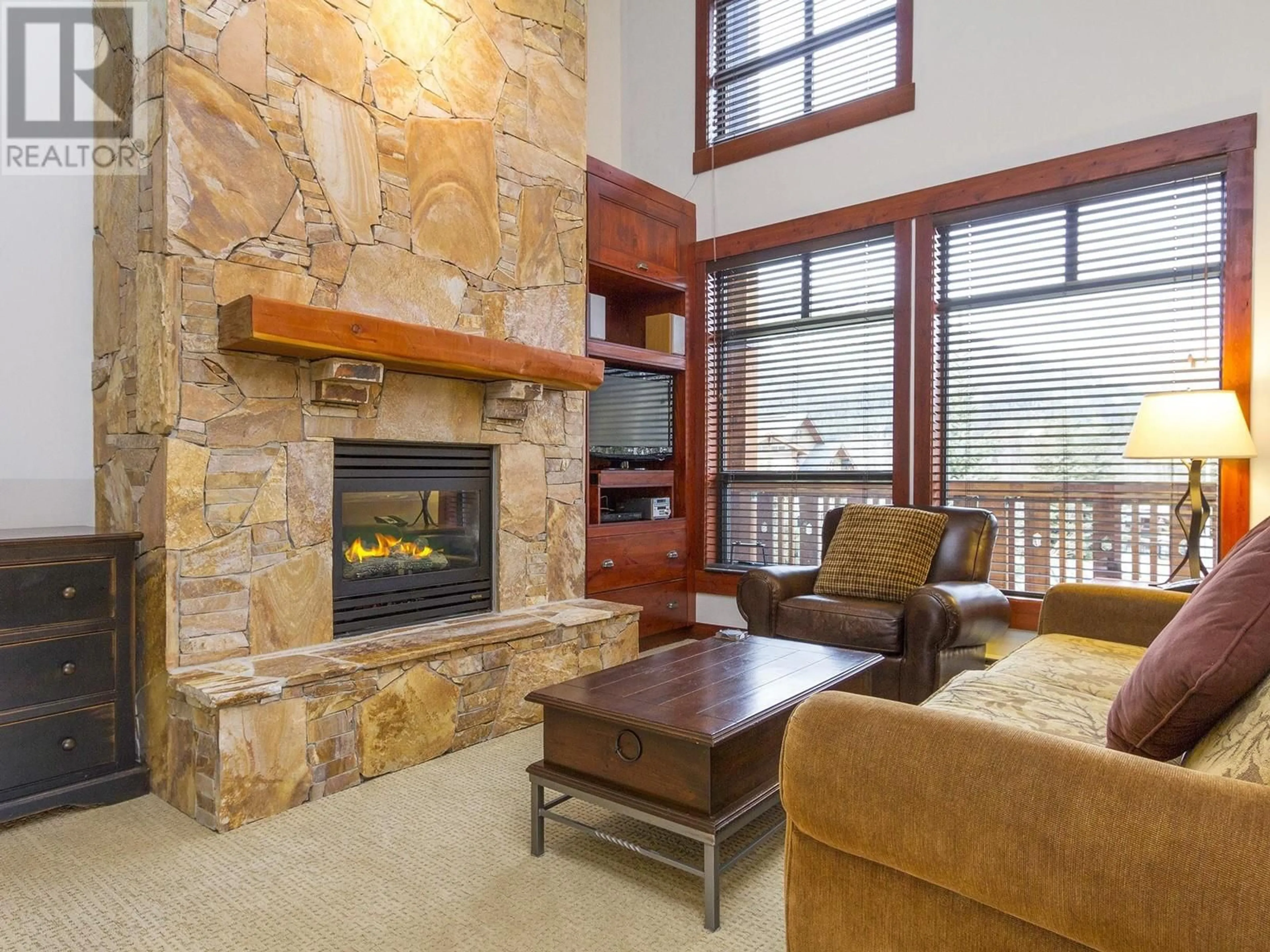 Living room with furniture, unknown for 208 - 2202 GONDOLA WAY, Whistler British Columbia V8E0M7