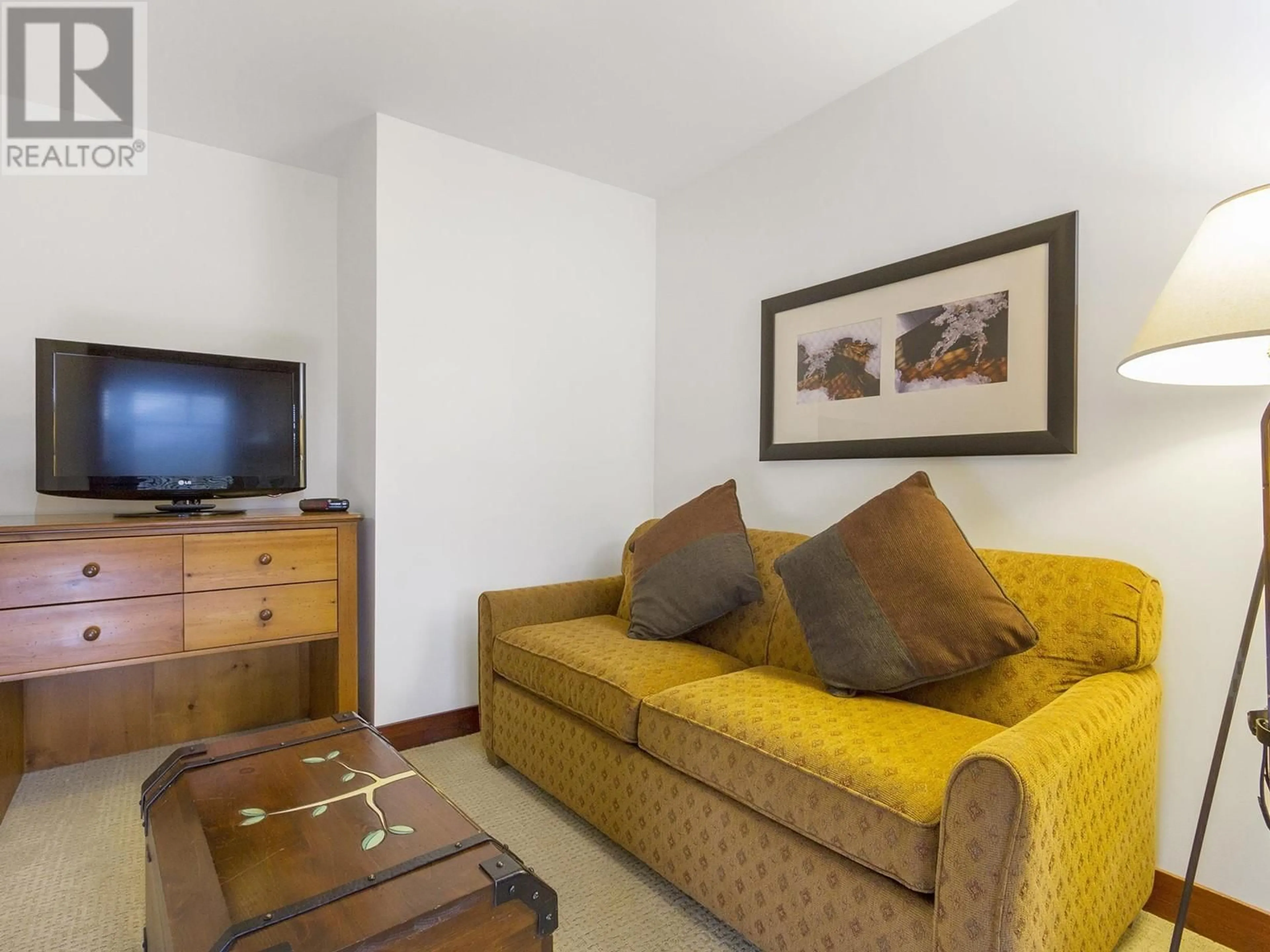 Living room with furniture, unknown for 208 - 2202 GONDOLA WAY, Whistler British Columbia V8E0M7
