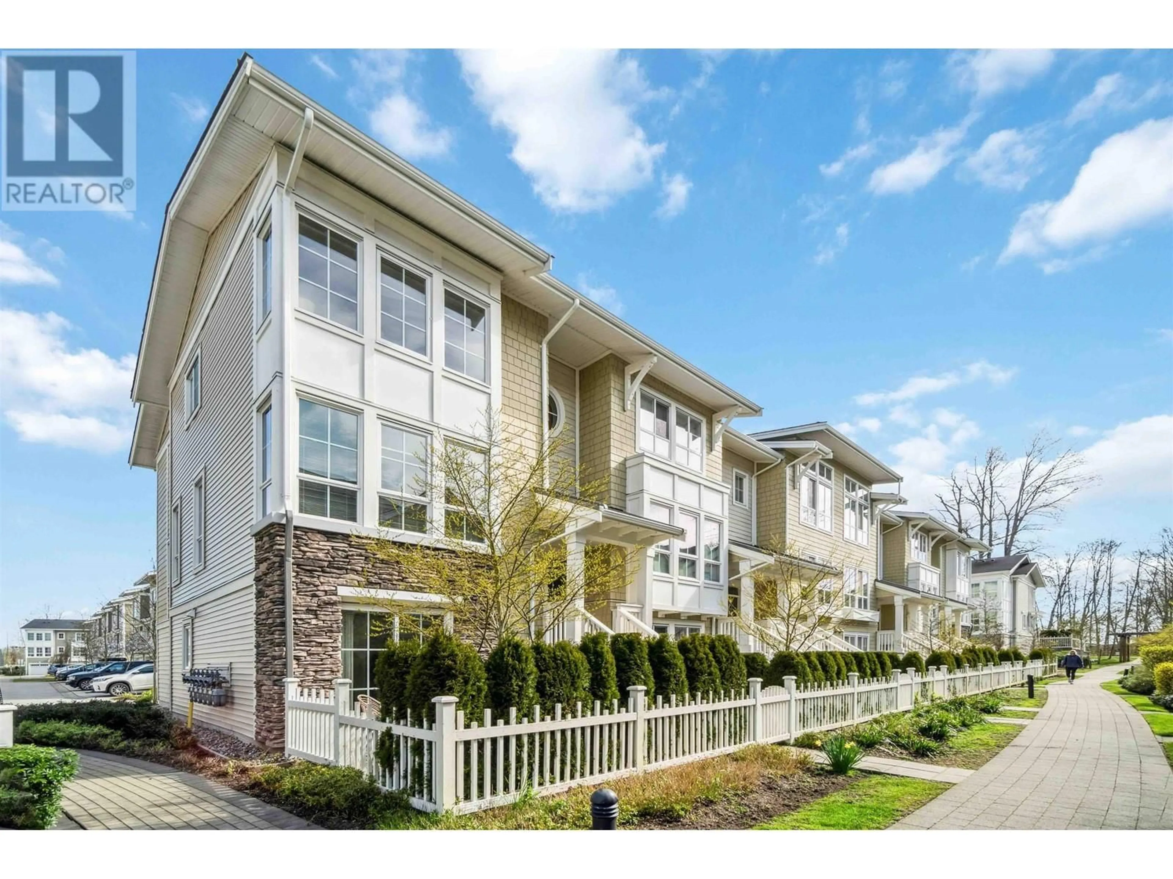 Home with vinyl exterior material, street for 52 - 5551 ADMIRAL WAY, Delta British Columbia V4K0C9