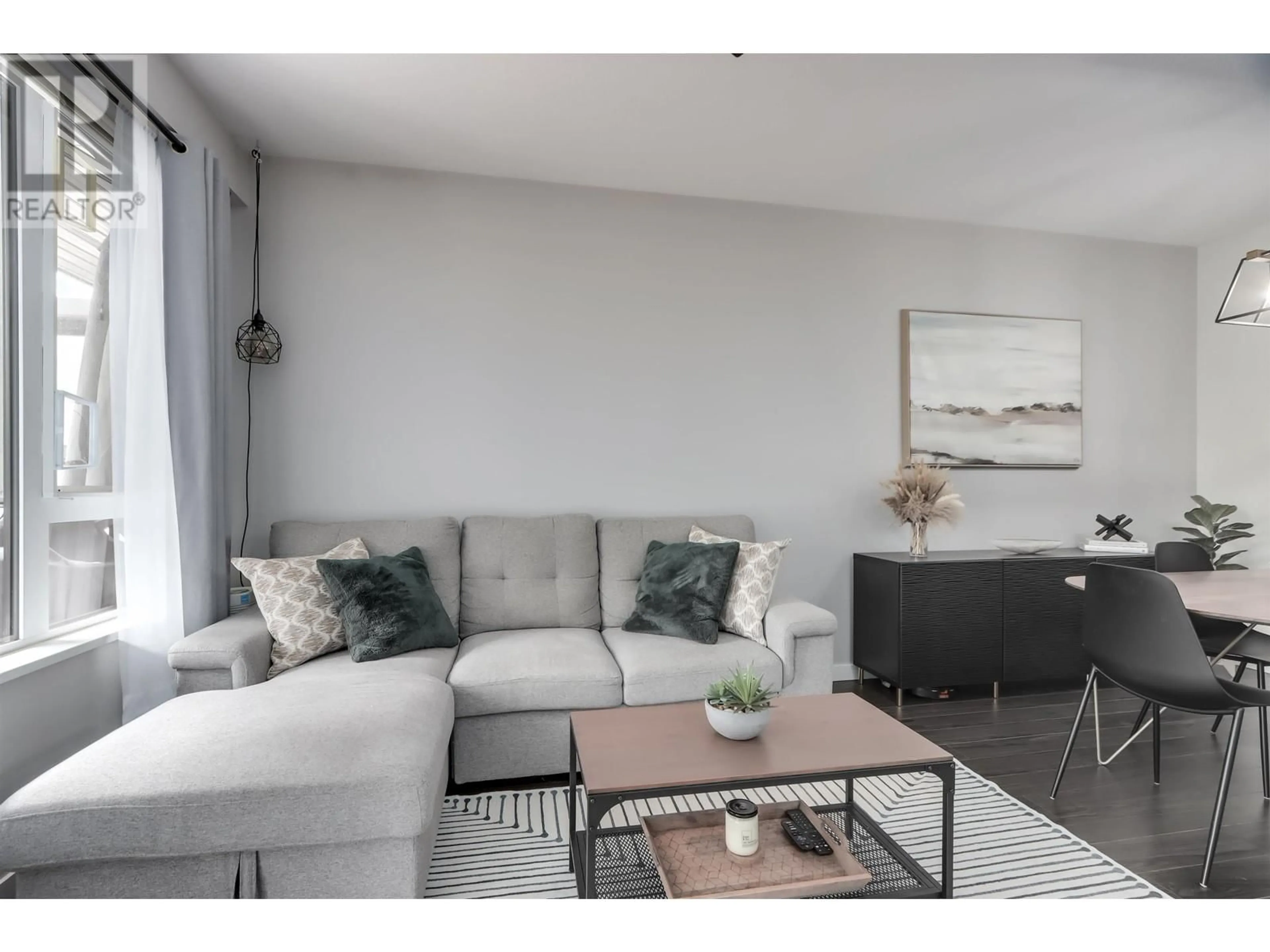Living room with furniture, unknown for 107 - 3163 RIVERWALK AVENUE, Vancouver British Columbia V5S0A8