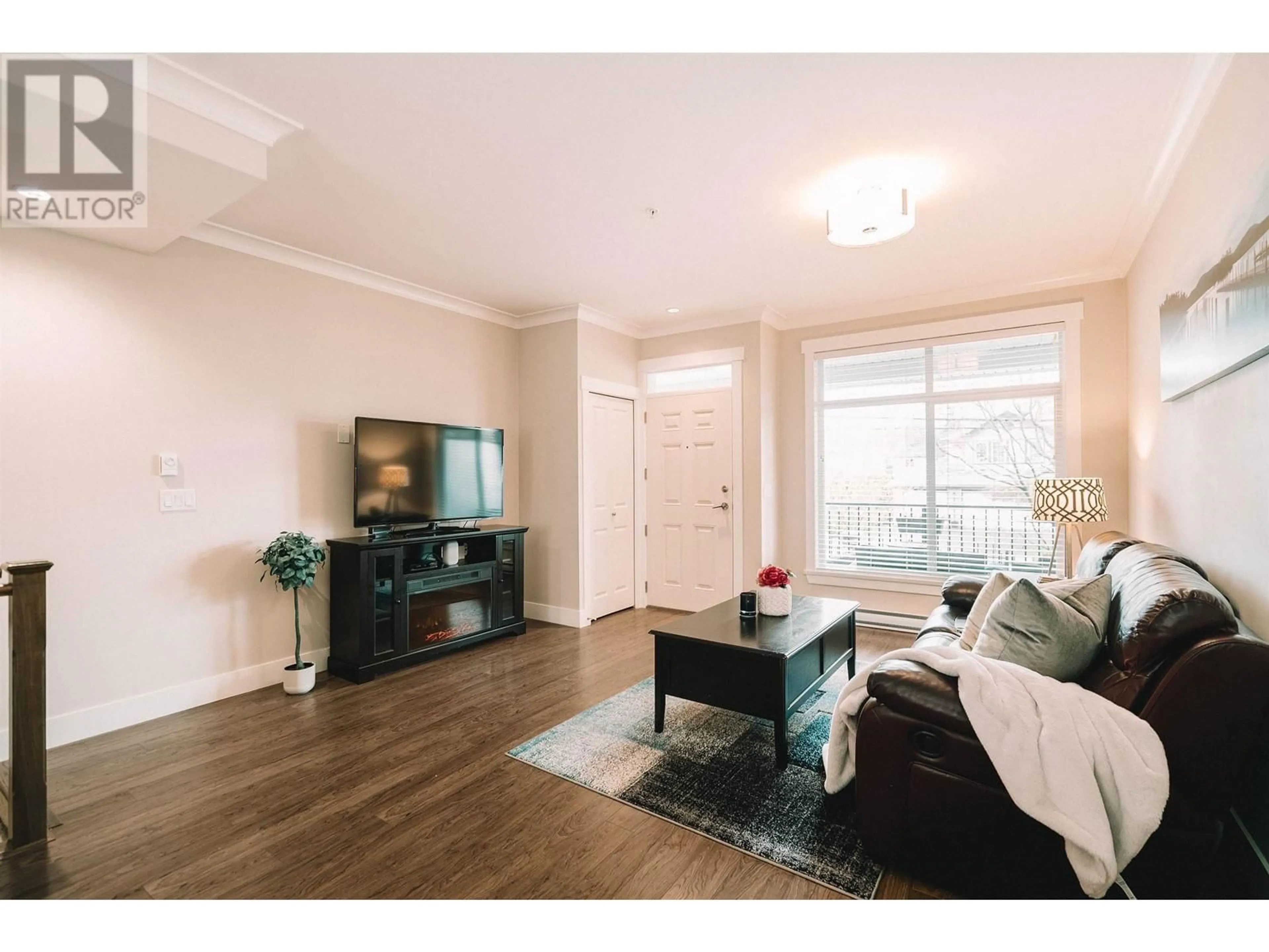 Living room with furniture, wood/laminate floor for 5 - 11461 236 STREET, Maple Ridge British Columbia V2W0H6