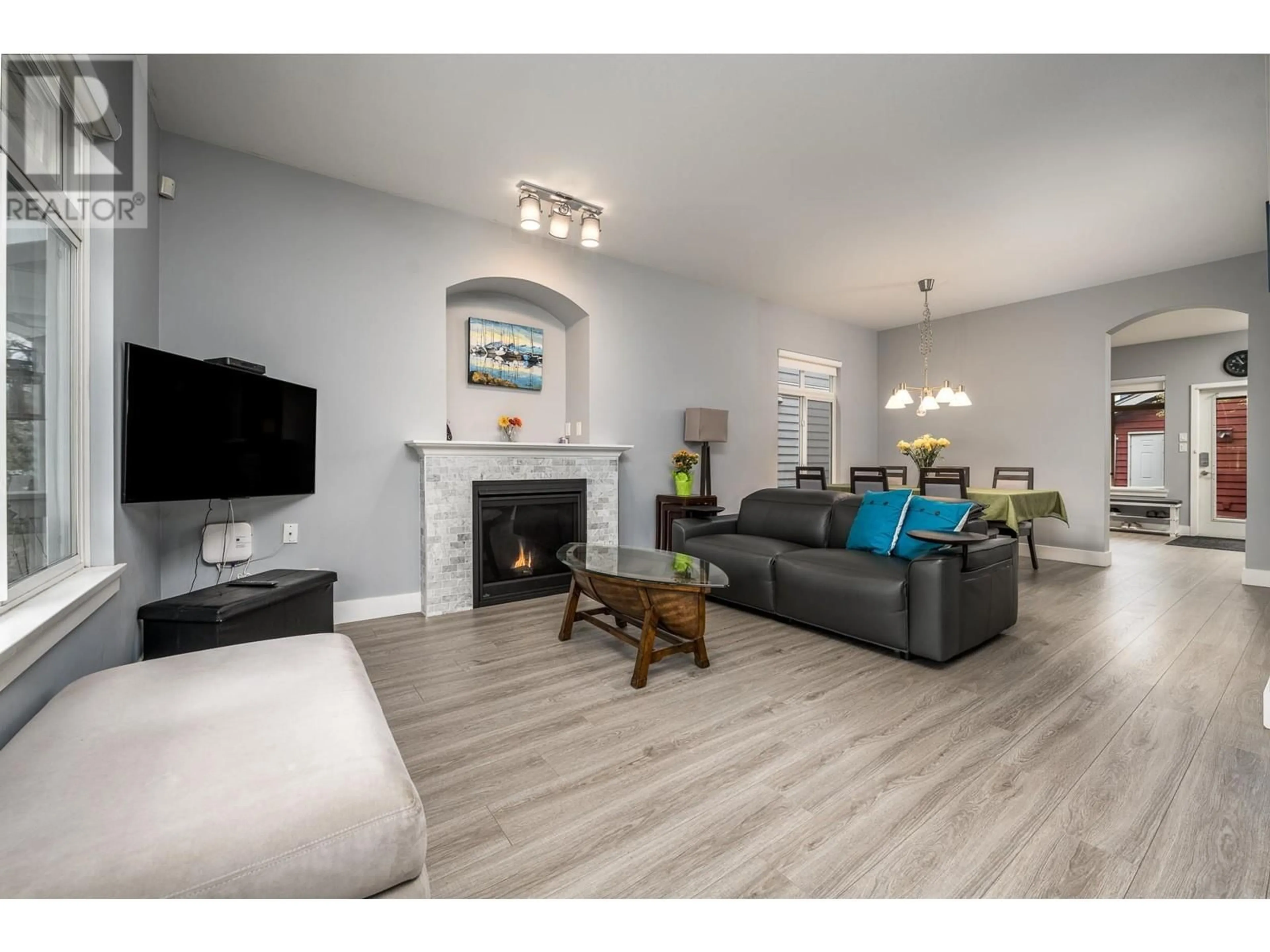 Living room with furniture, wood/laminate floor for 155 DOCKSIDE COURT, New Westminster British Columbia V3M0B2